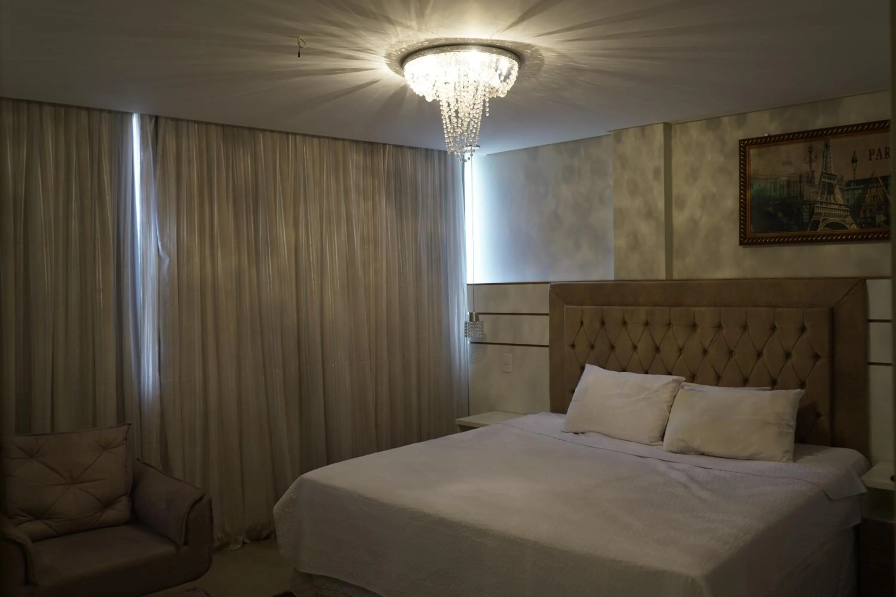 Bed in Pak Suítes Hotel