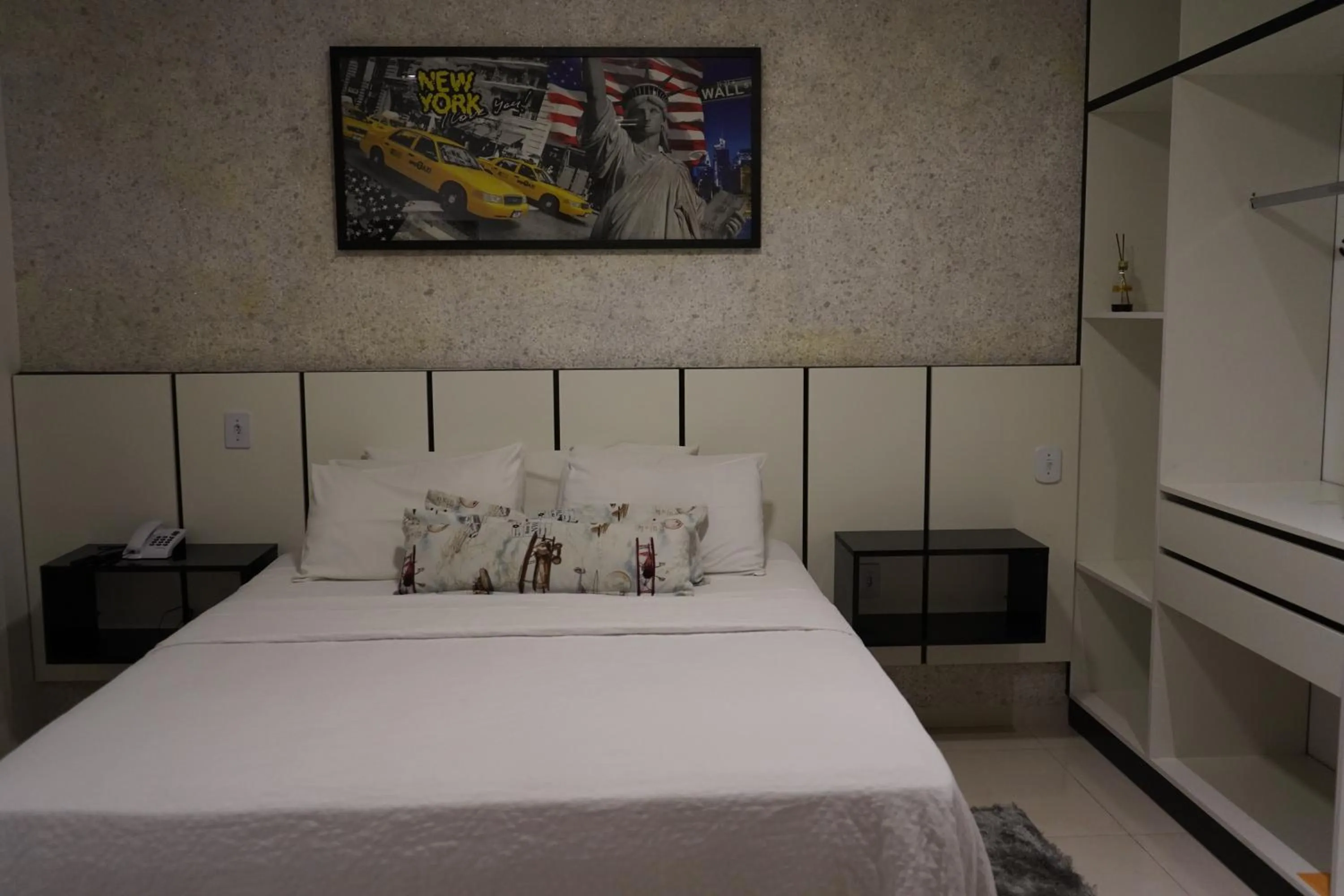 Bed in Pak Suítes Hotel