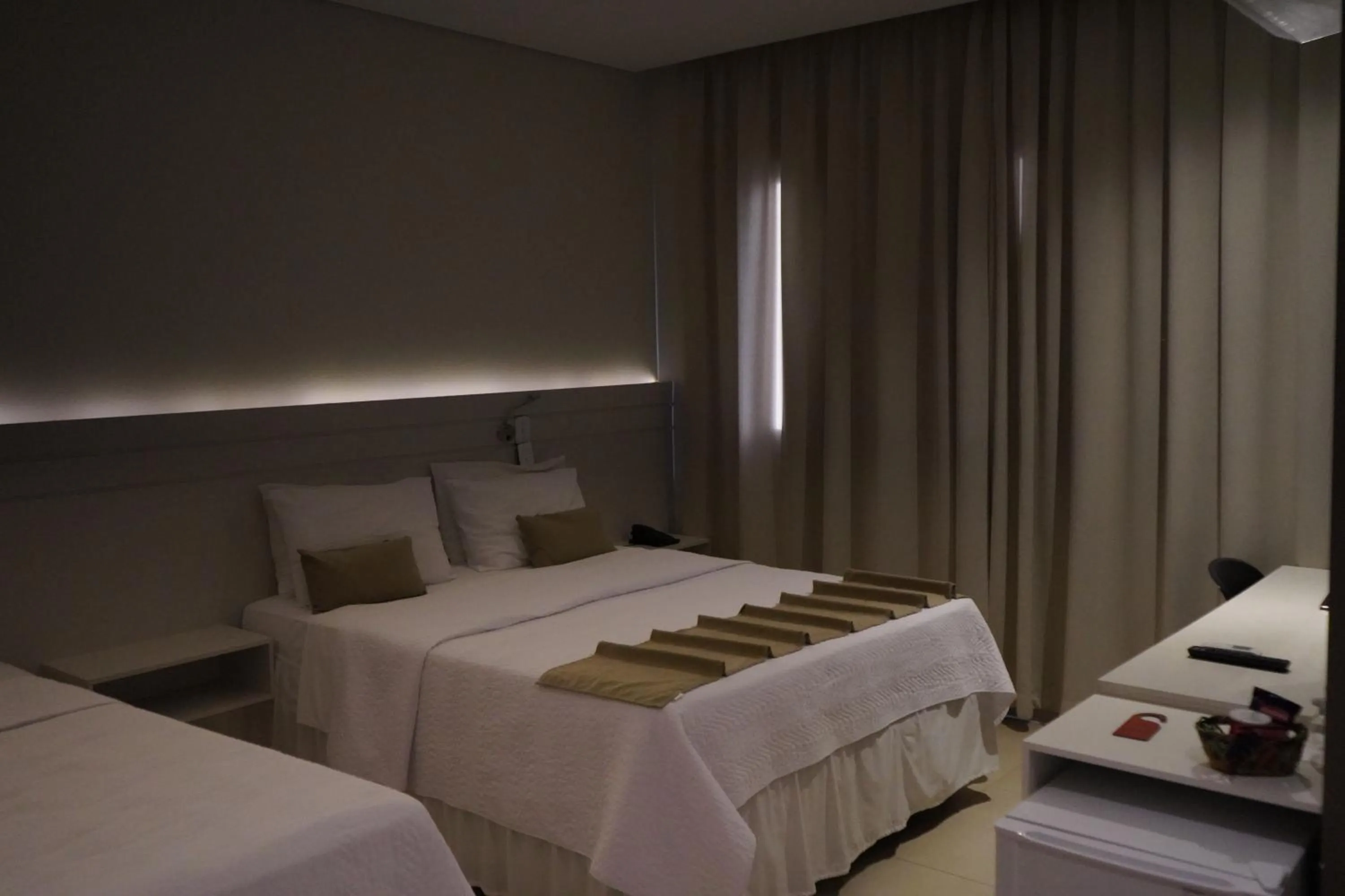 Bed in Pak Suítes Hotel