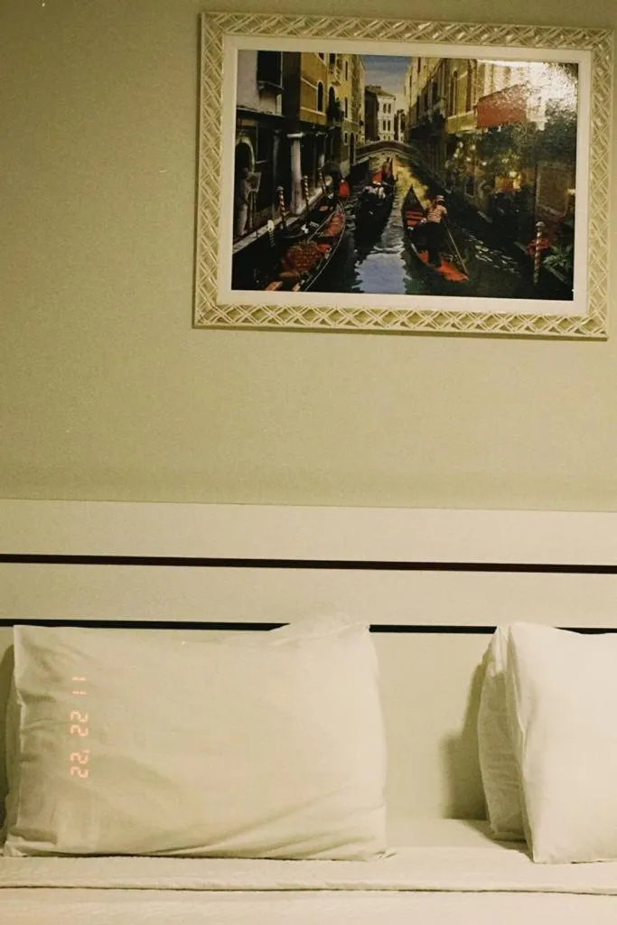 Bed in Pak Suítes Hotel