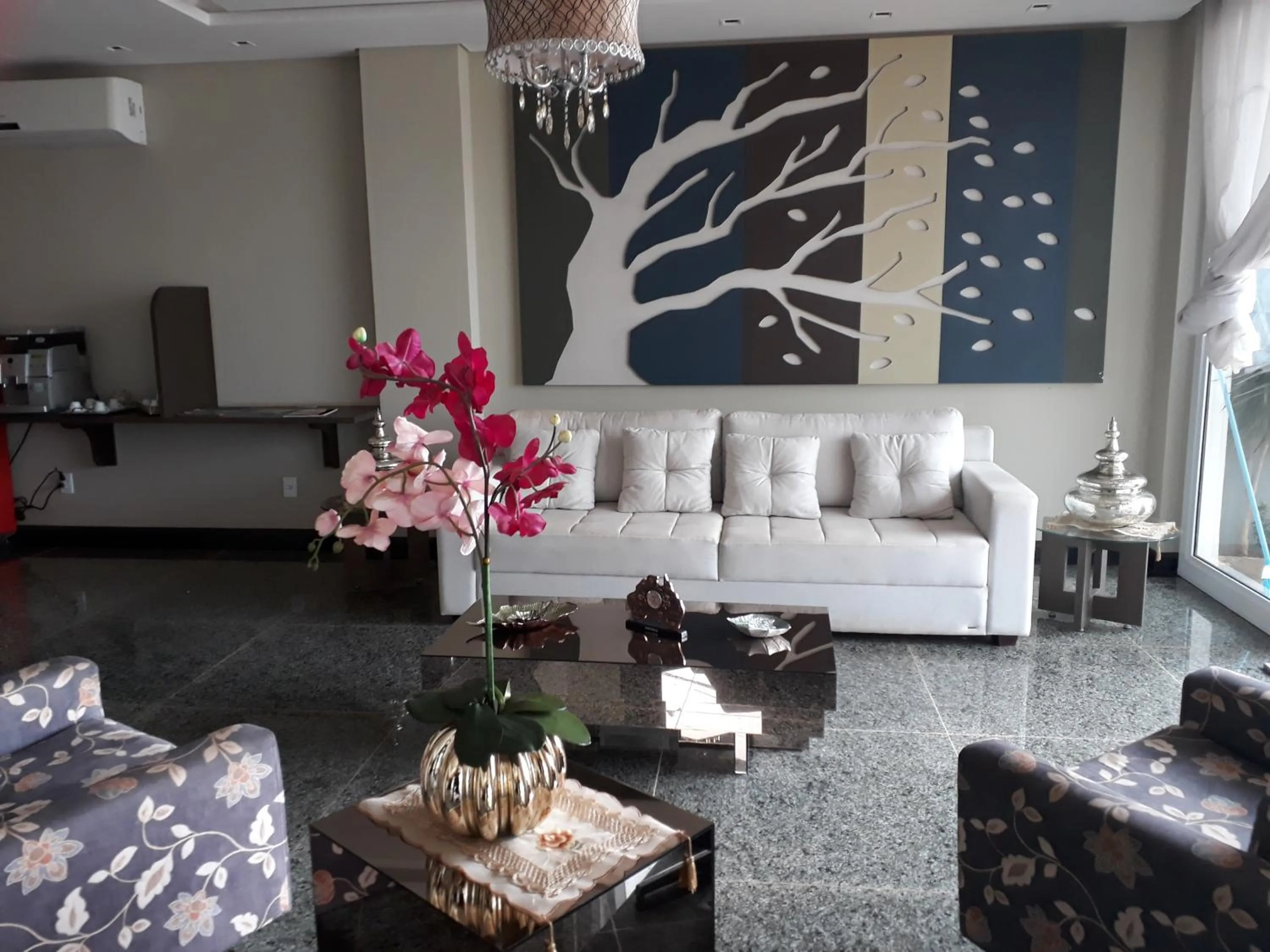 Living room in Pak Suítes Hotel