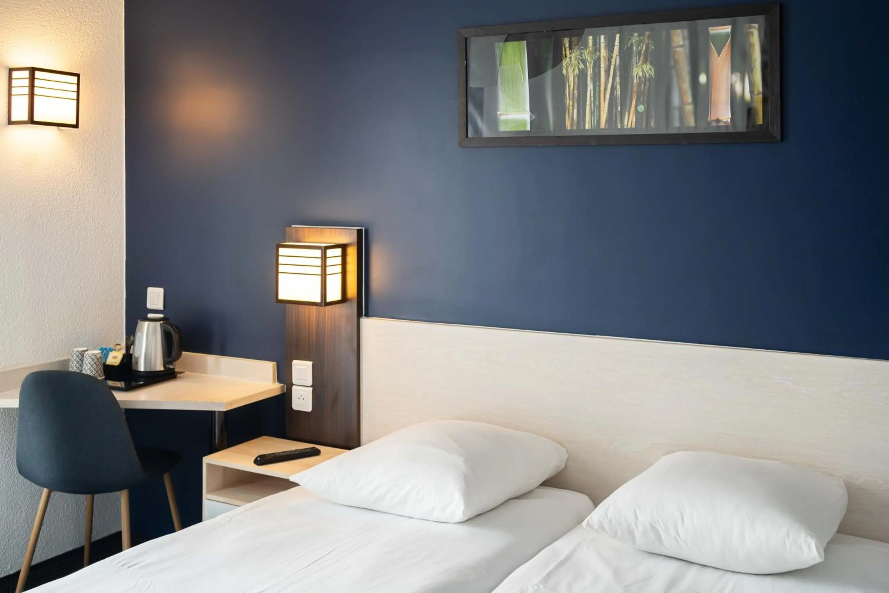 Bed in Urban by balladins Eaubonne