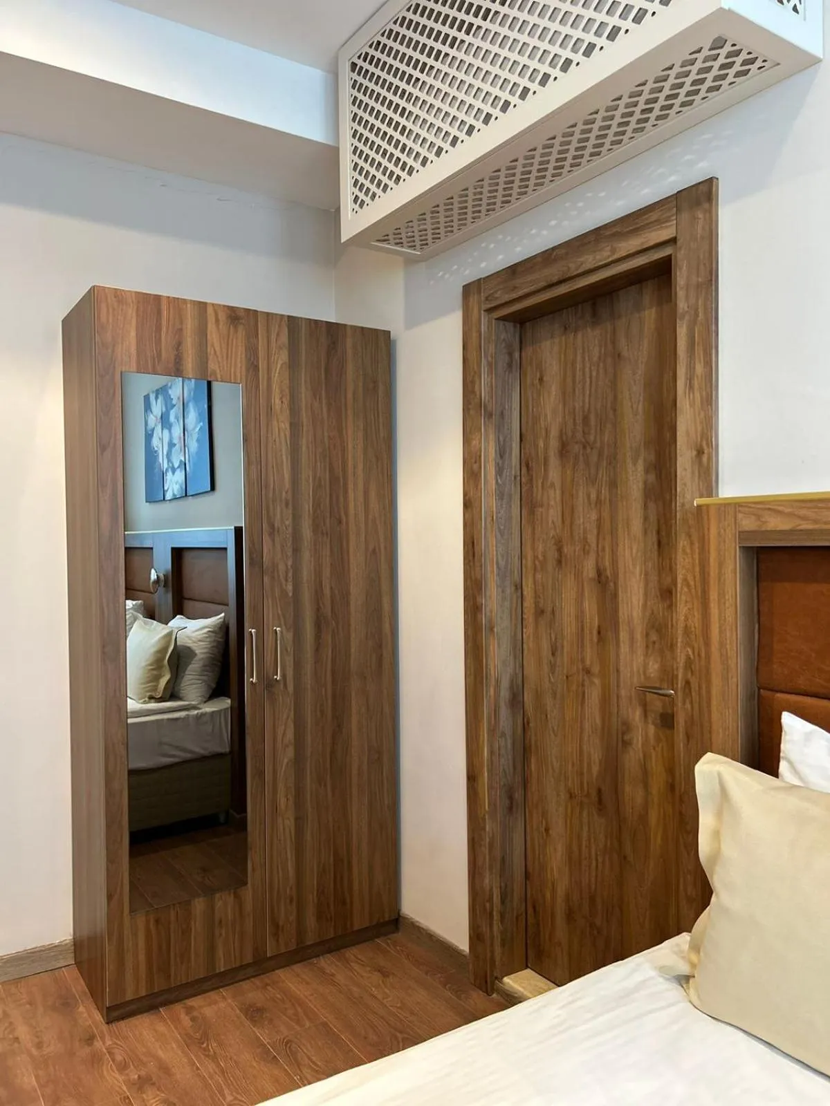 wardrobe, Bed in Sky Tower King Hotel