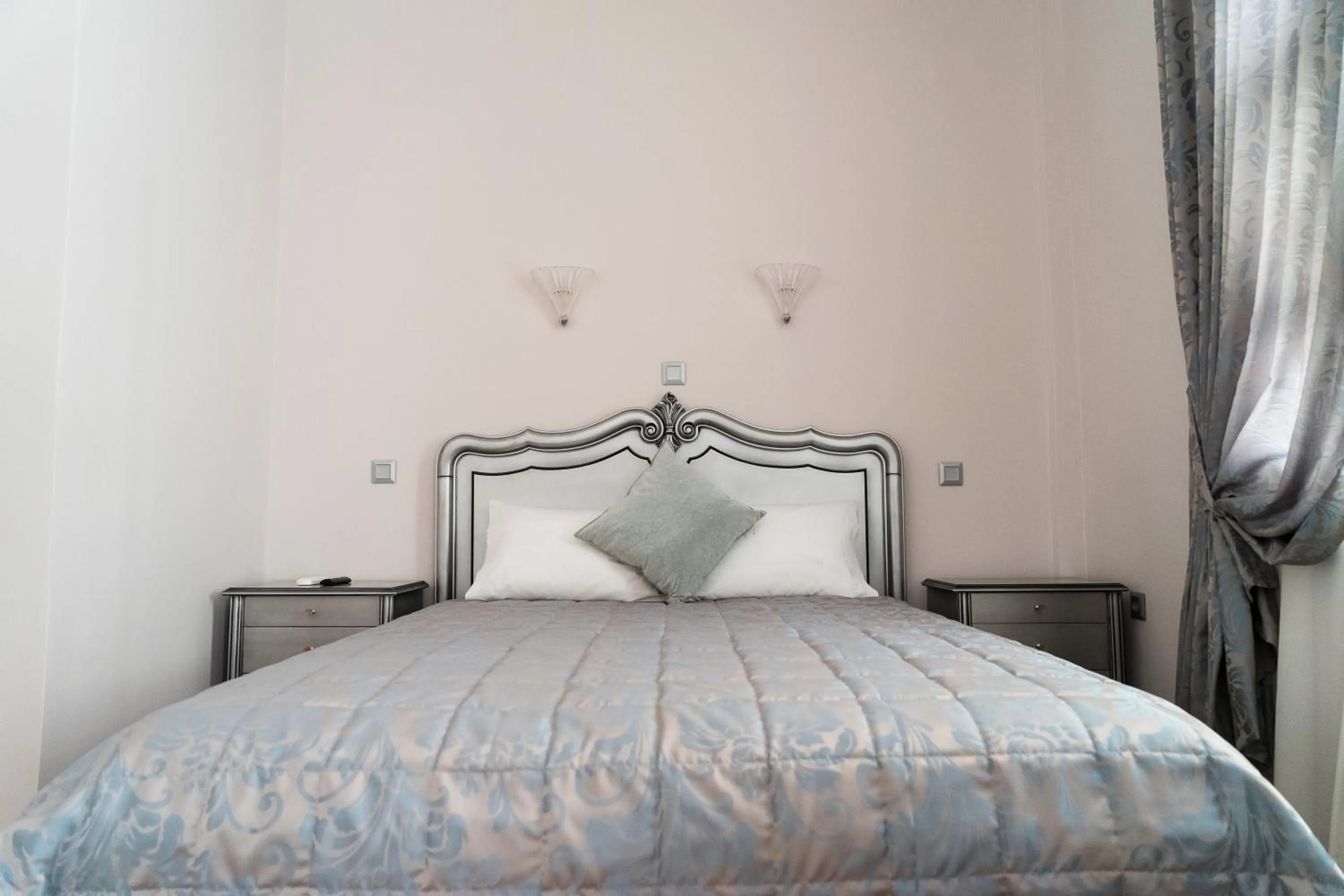 Bed in Le Bijou Luxury Rooms & Suites