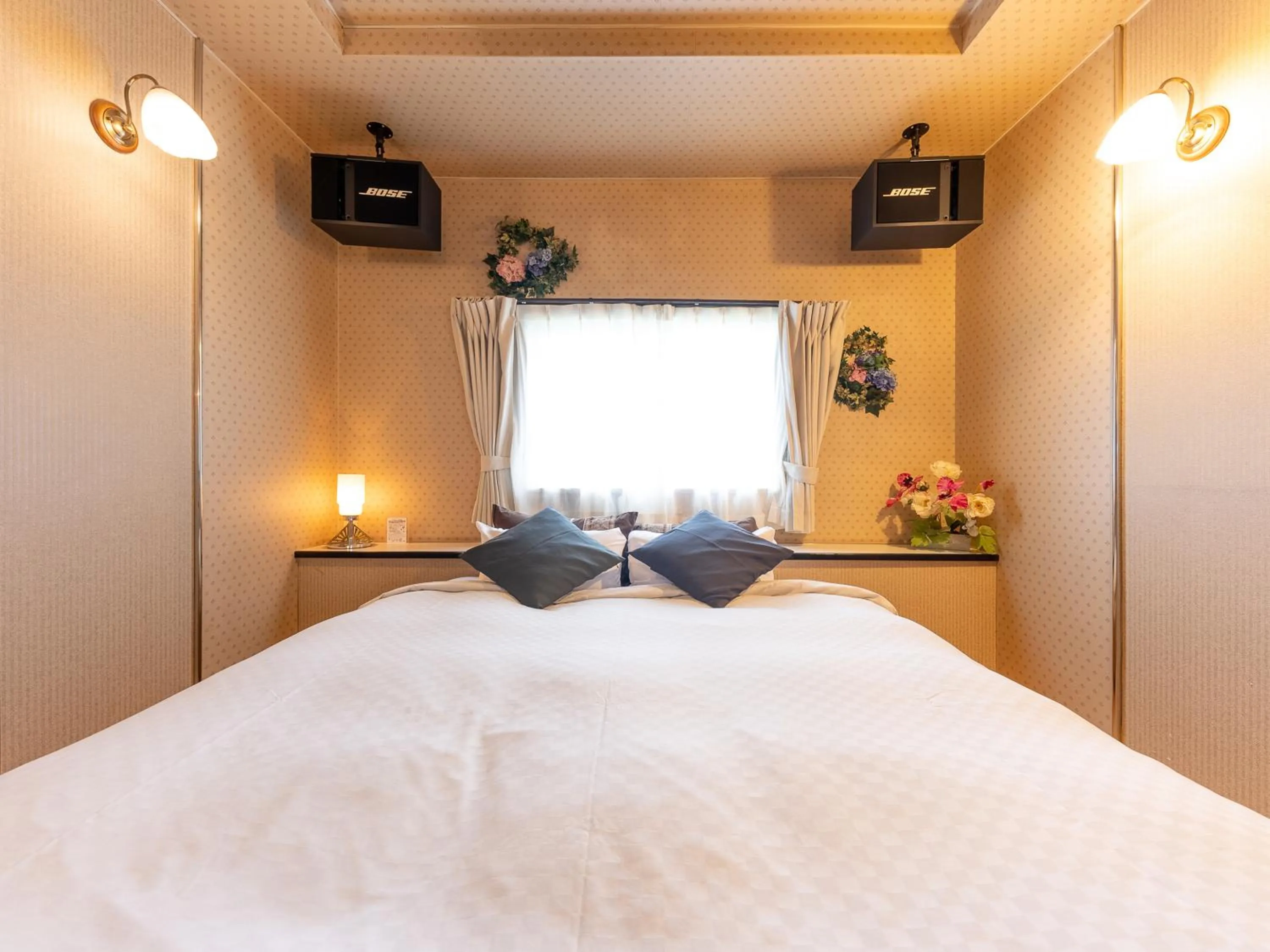 Bed in Tabist Hotel Nizi Fuefuki Misaka