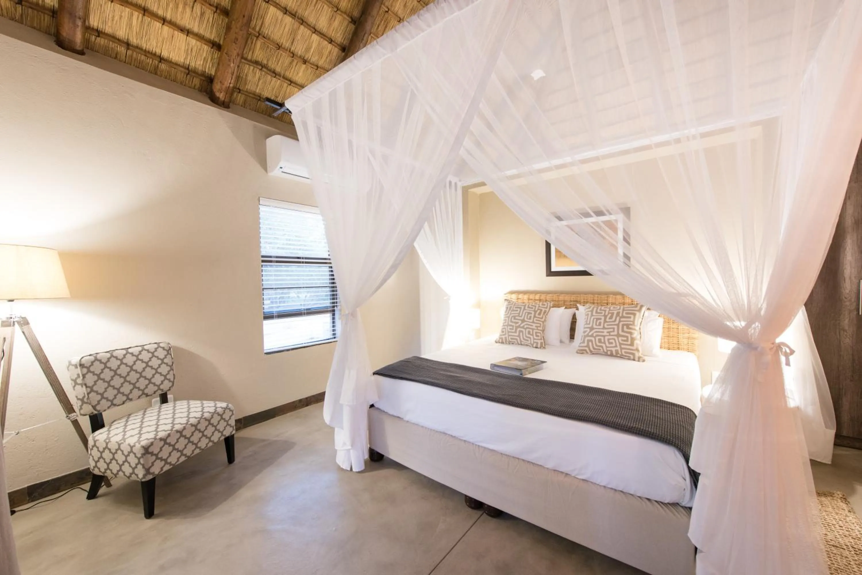 Photo of the whole room, Bed in Bushbaby River Lodge