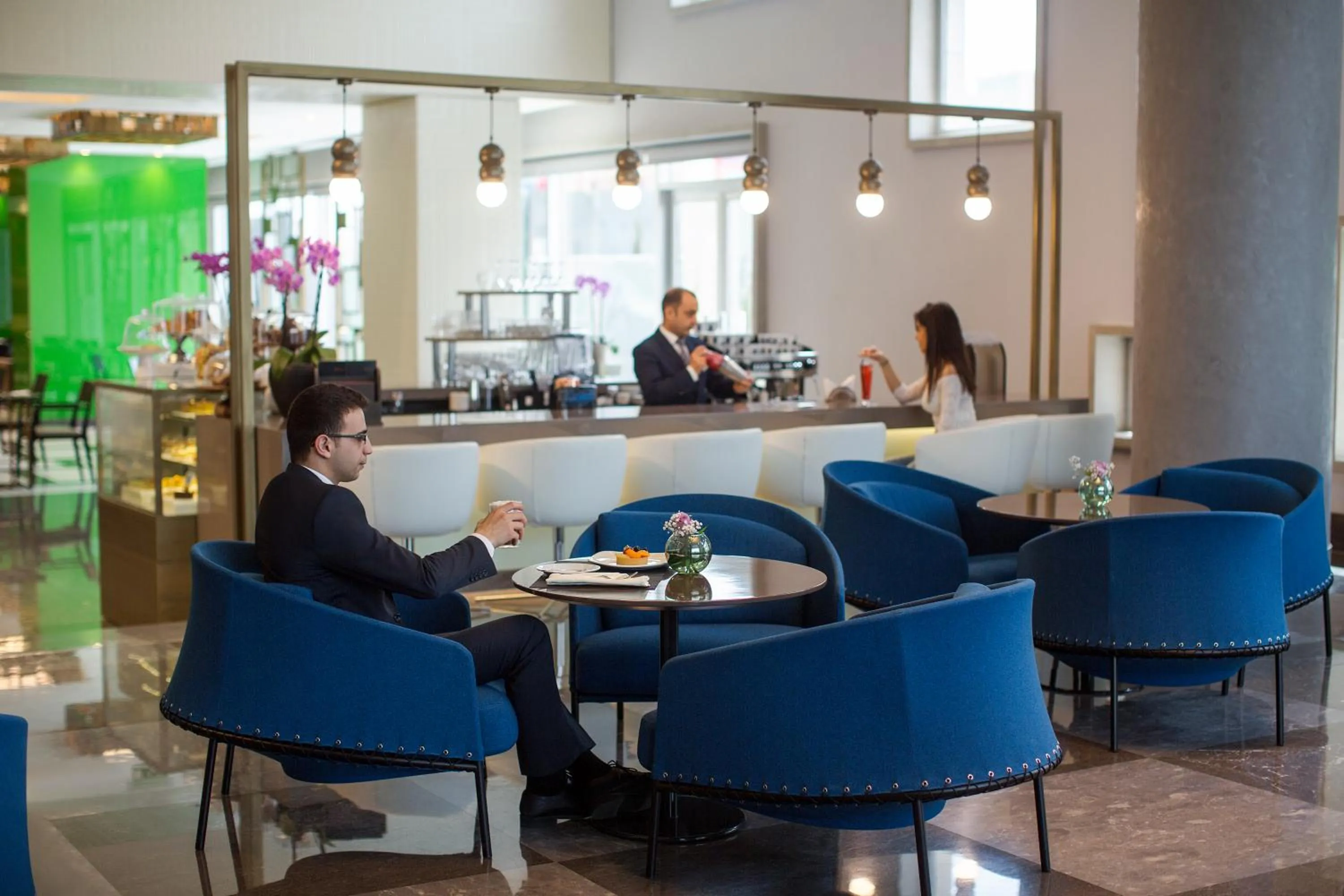 Lounge or bar in Erbil Arjaan by Rotana