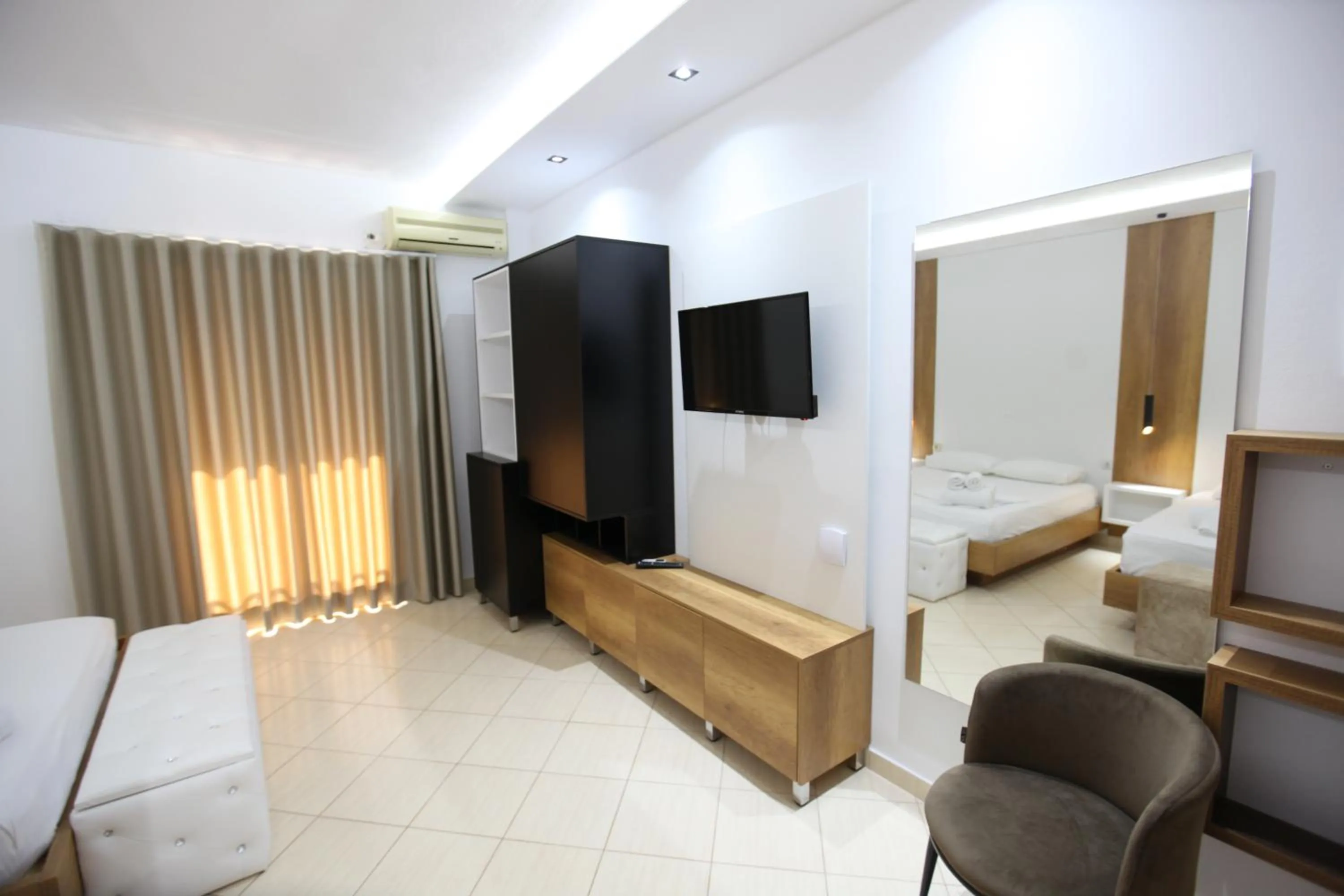 Seating area, Bed in Ksamil Central Park Hotel