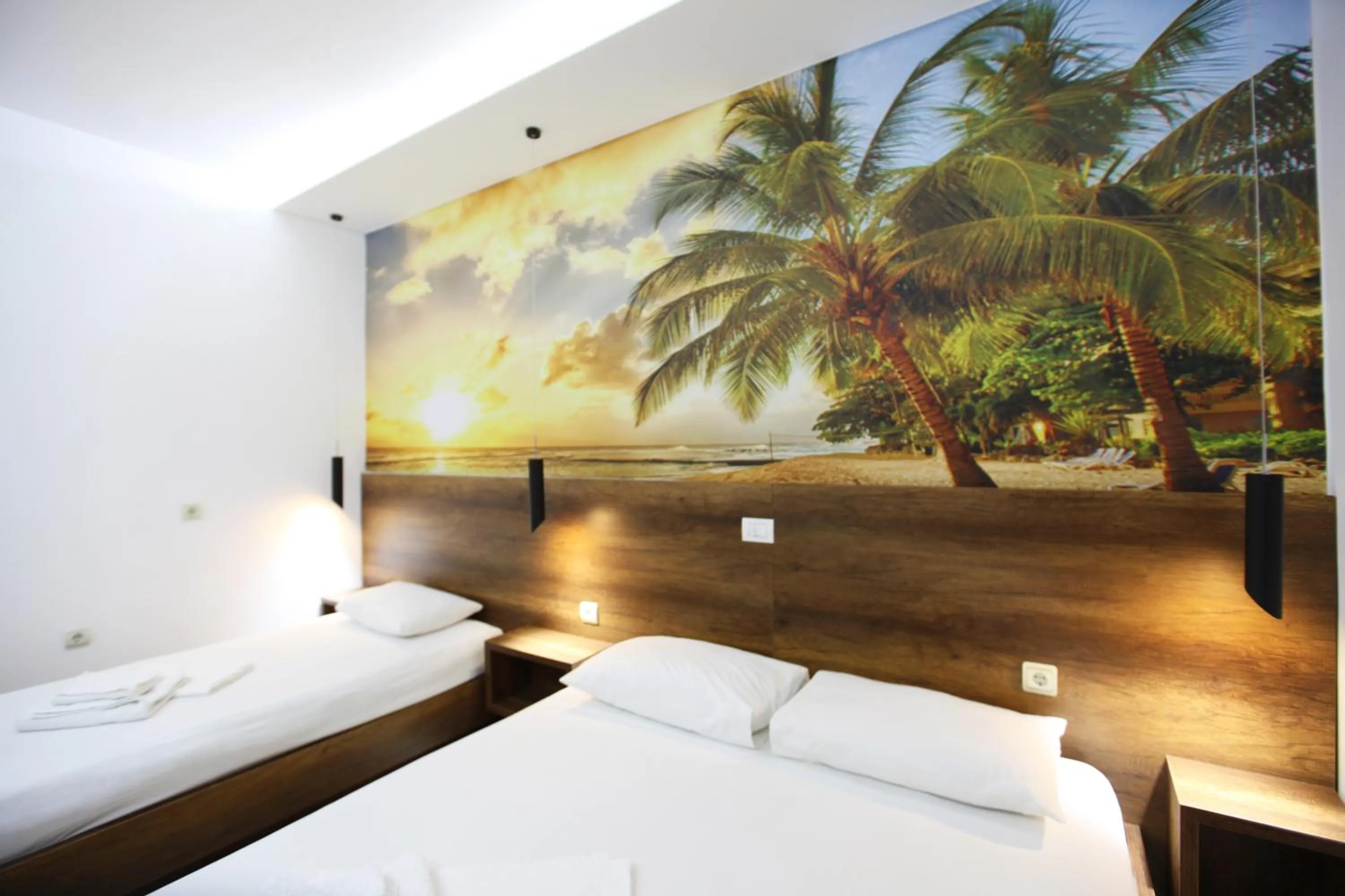 Bed in Ksamil Central Park Hotel