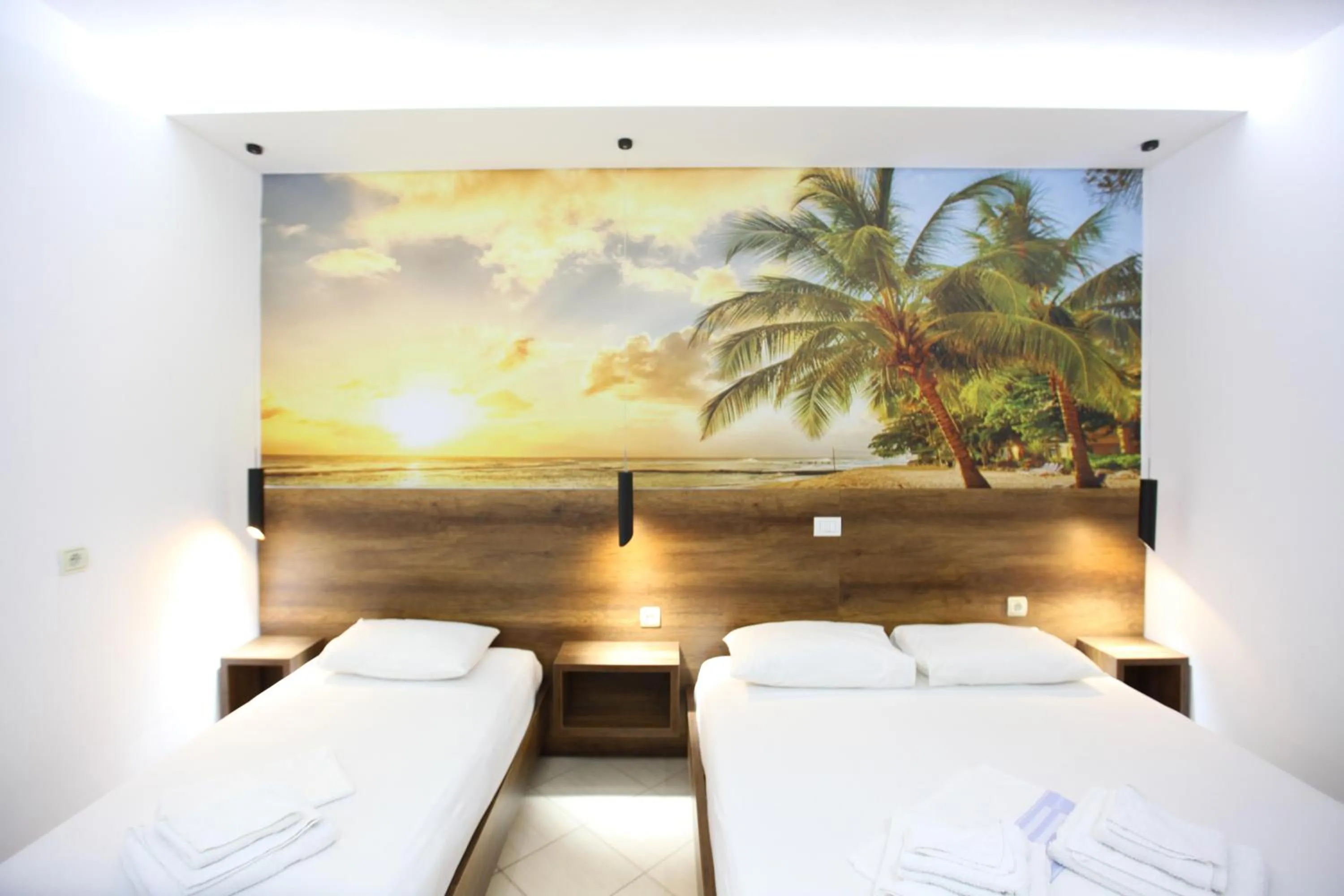 Bed in Ksamil Central Park Hotel