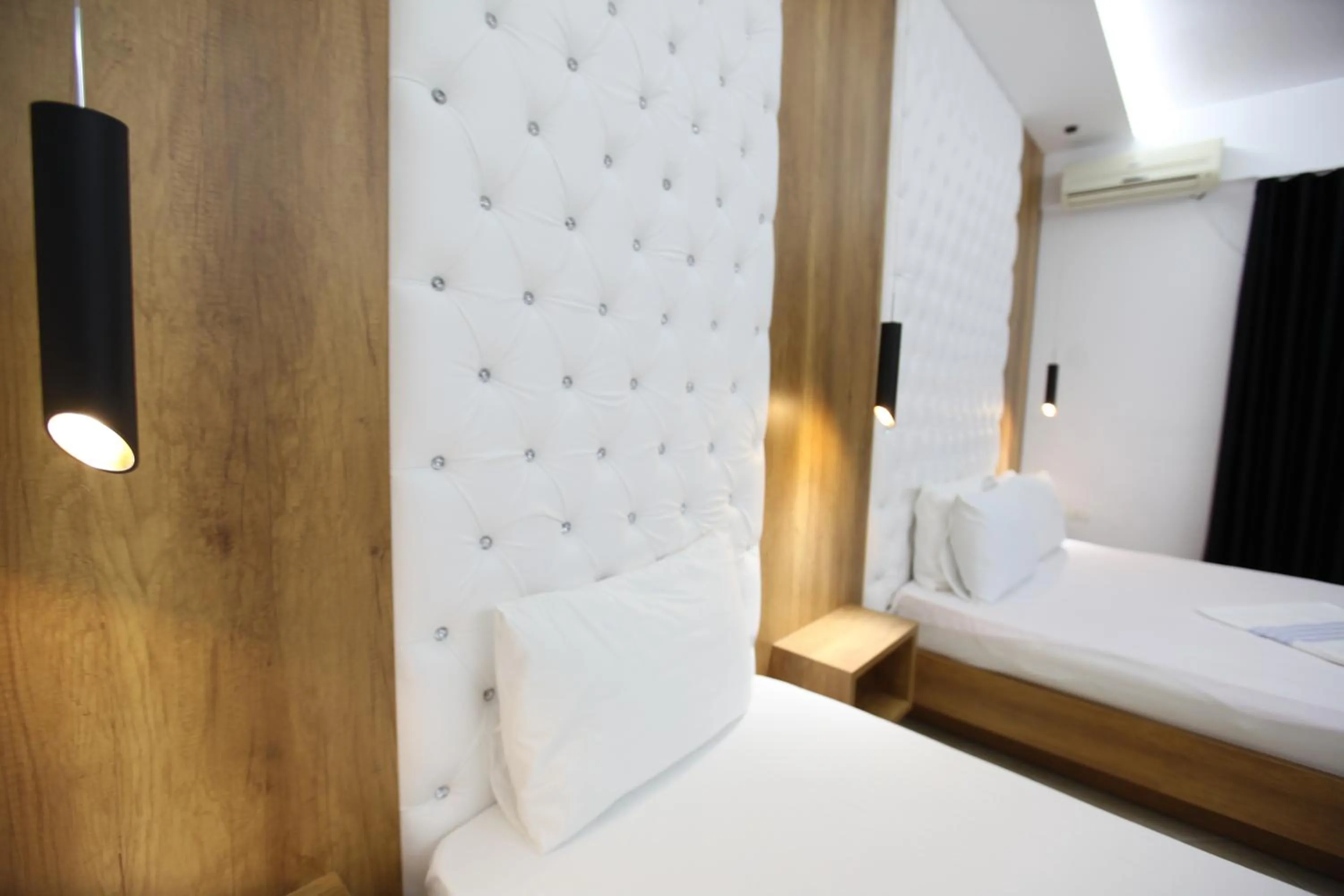 Bed in Ksamil Central Park Hotel