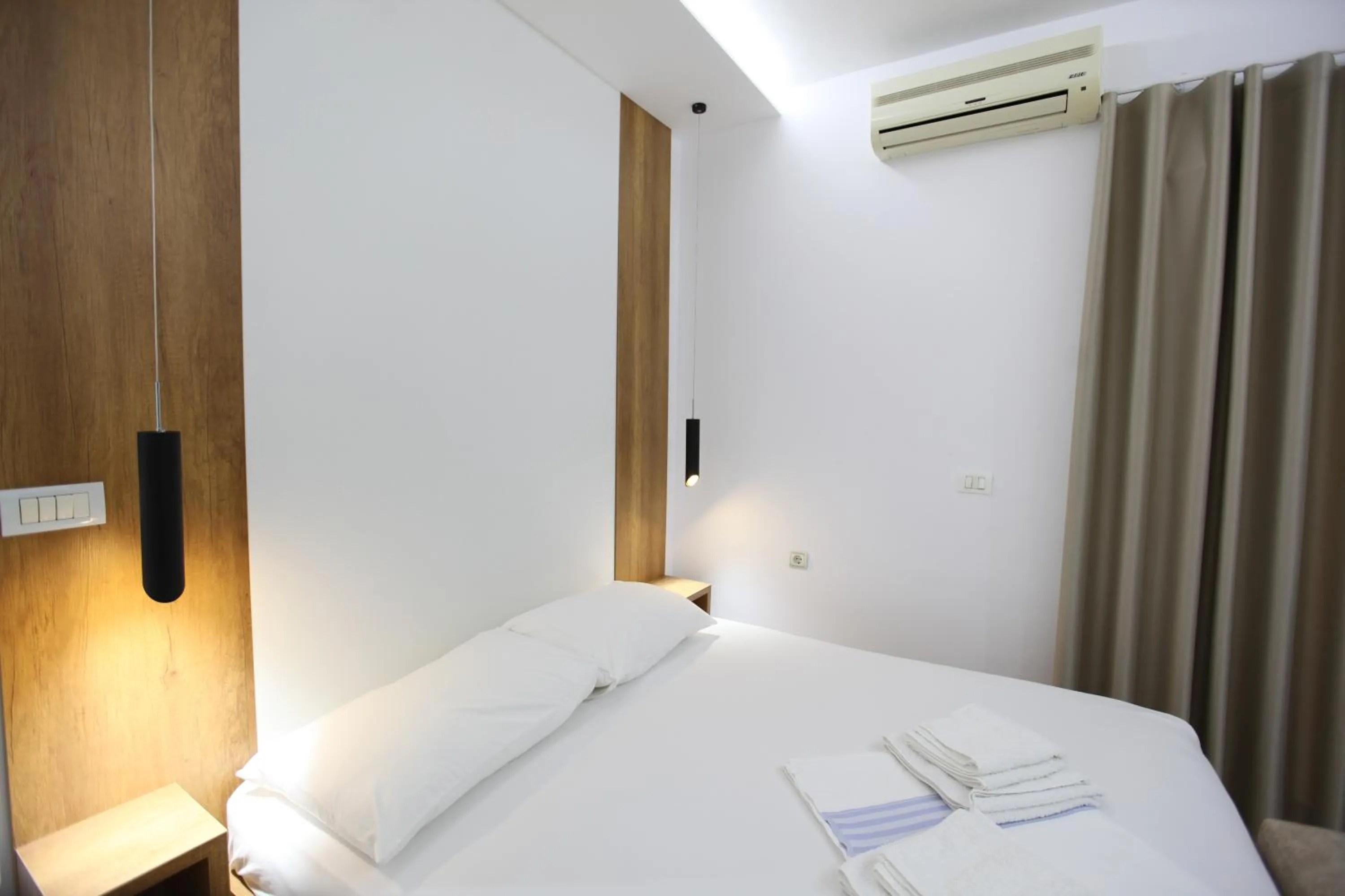 Bed in Ksamil Central Park Hotel