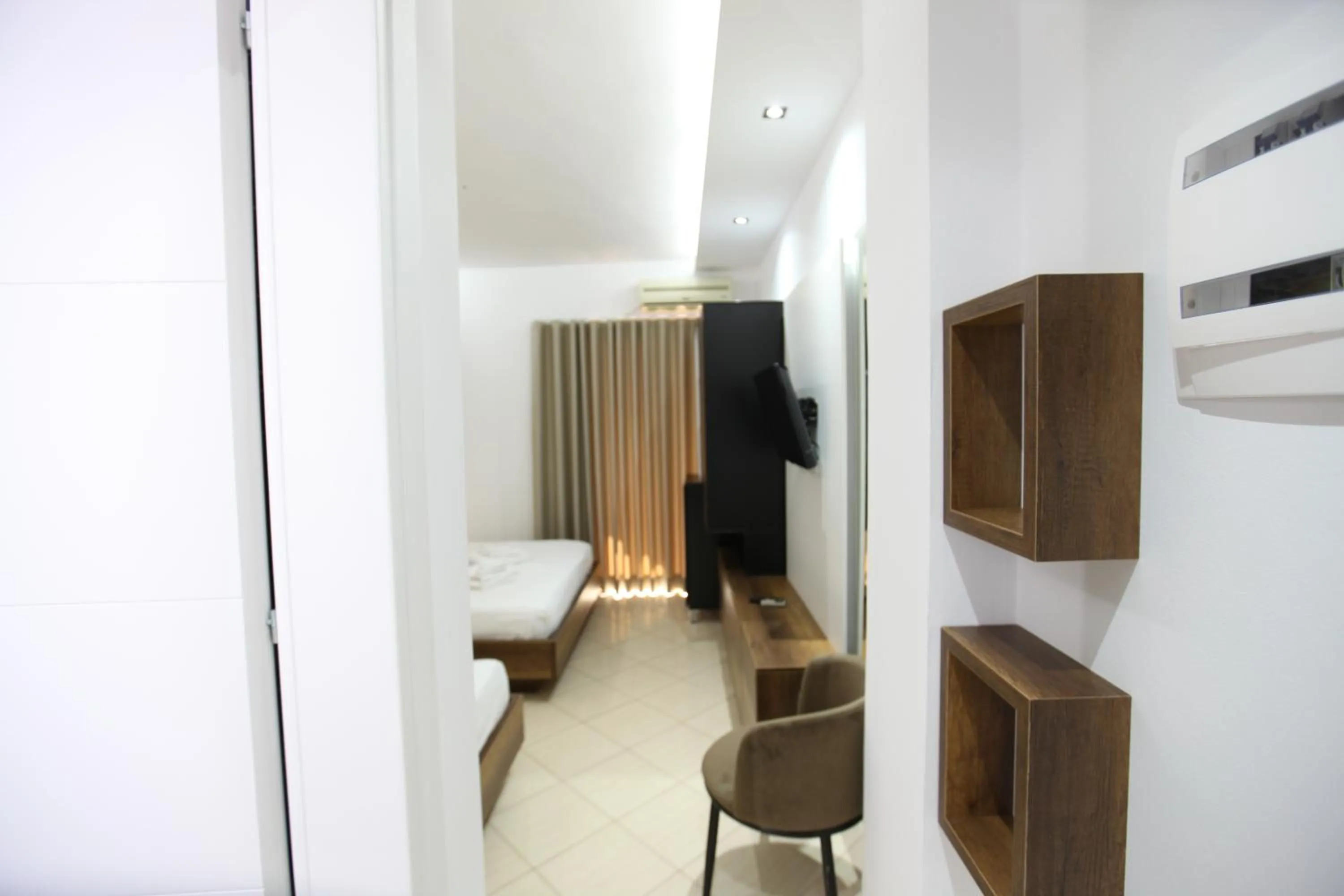 Photo of the whole room in Ksamil Central Park Hotel