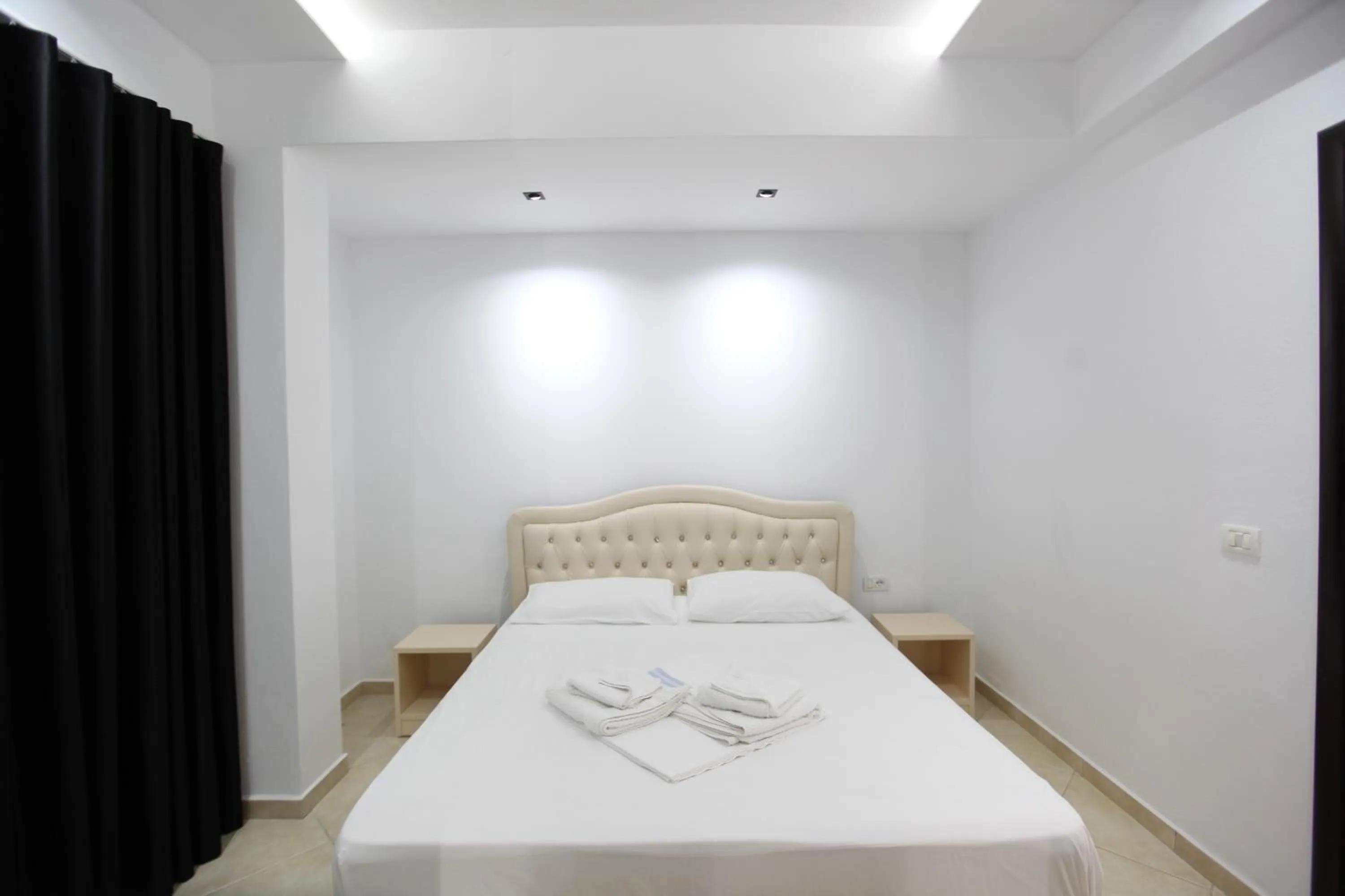 Bed in Ksamil Central Park Hotel