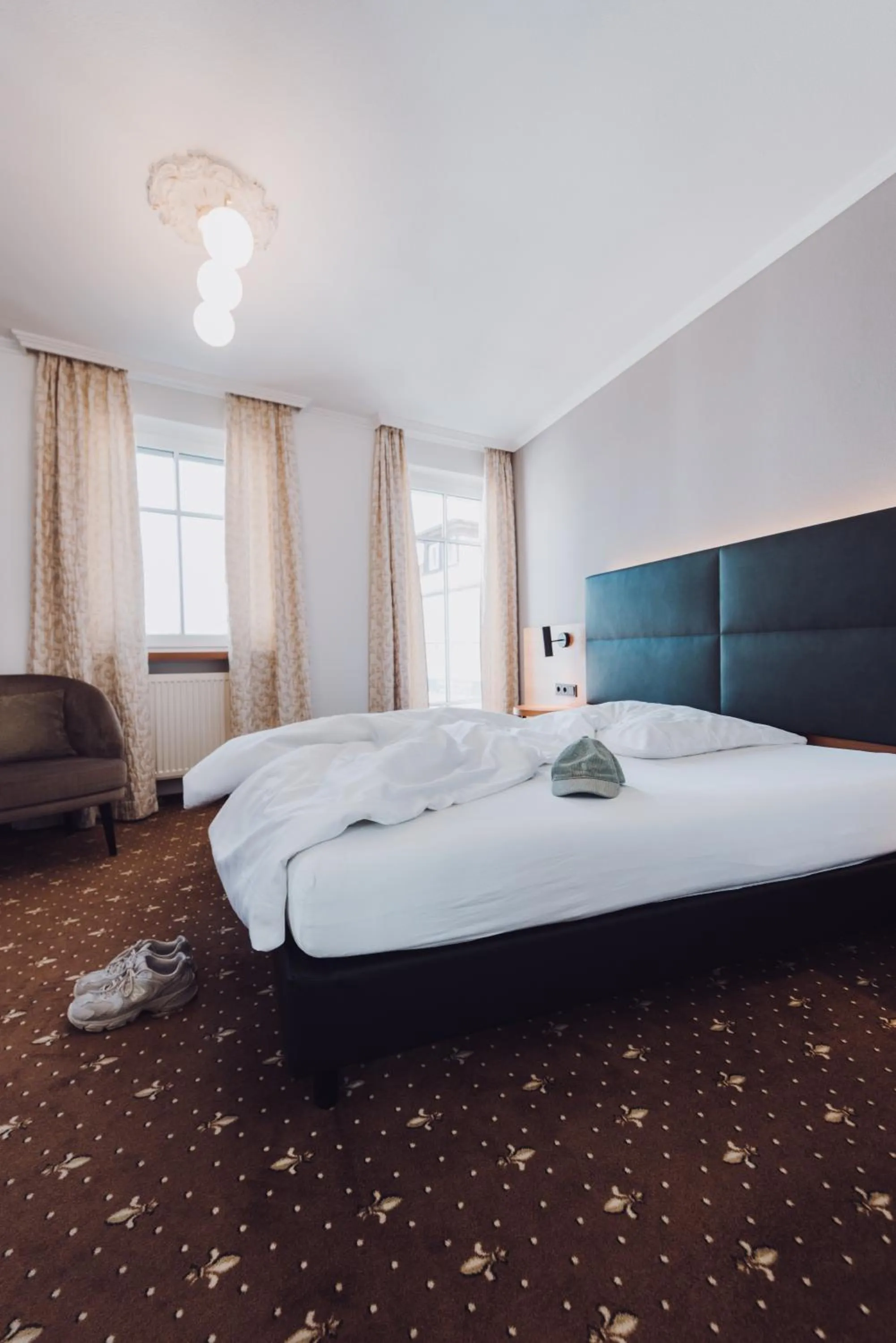 Photo of the whole room, Bed in Ambienthotel Tassilo