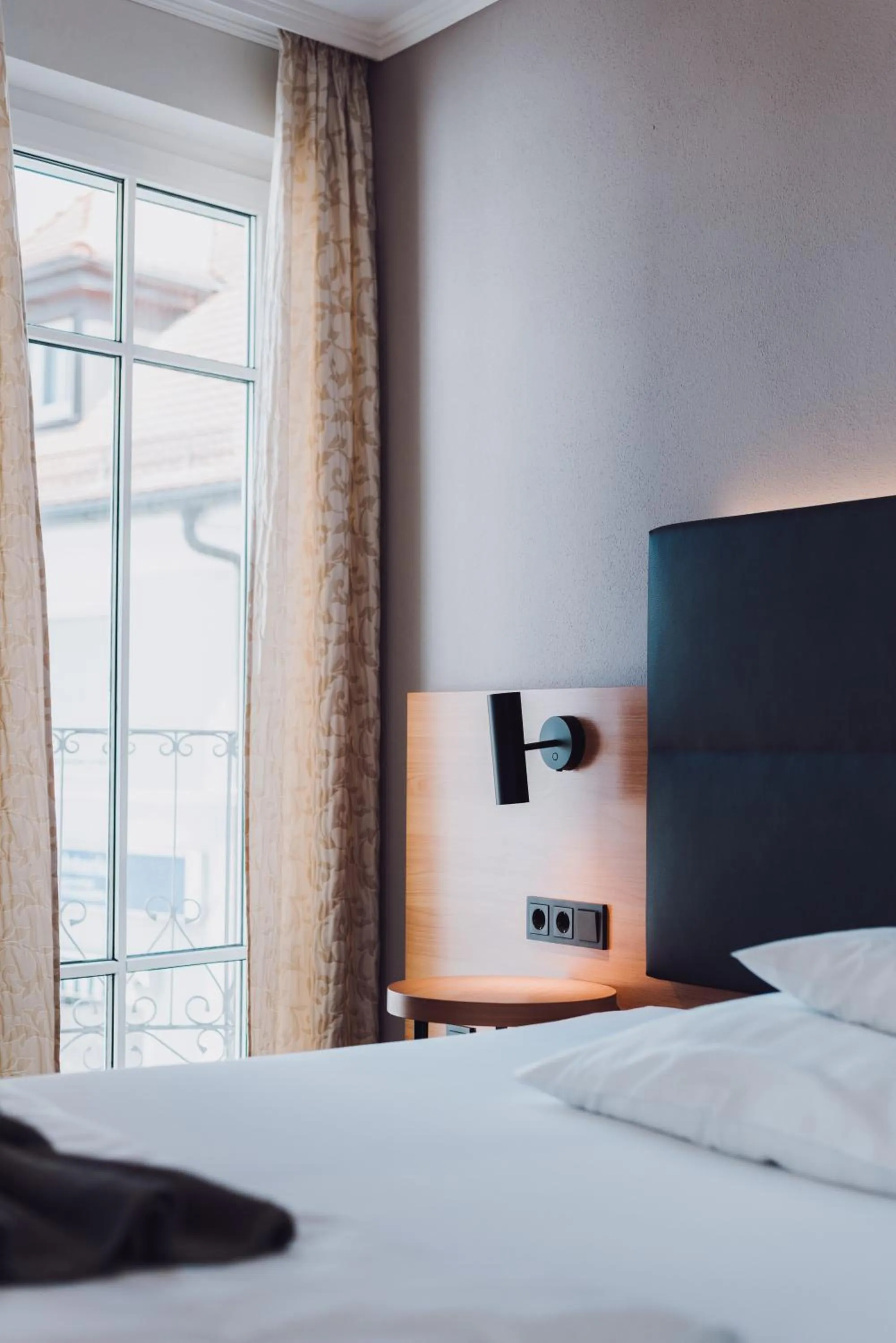 Bed in Ambienthotel Tassilo