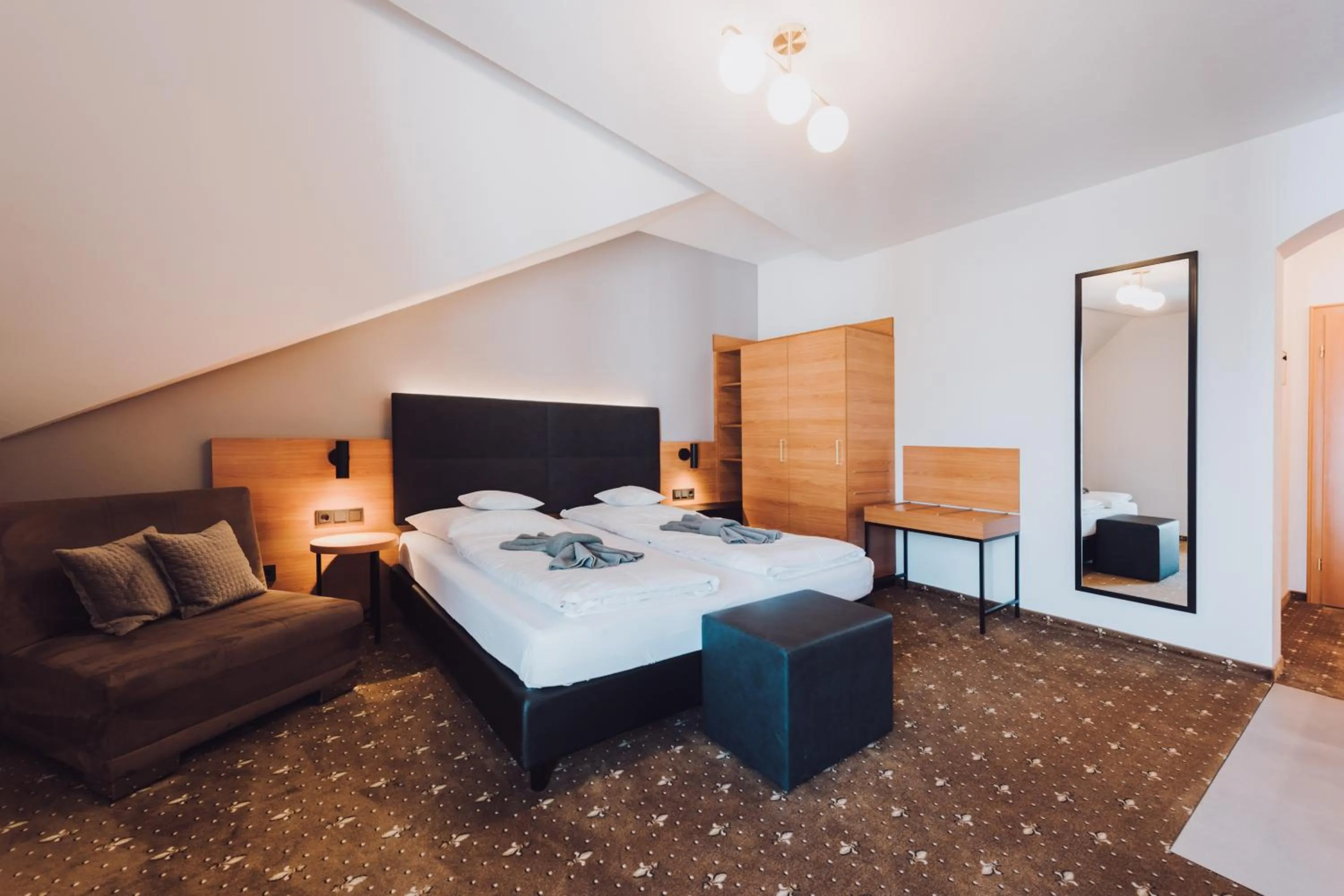 Bed in Ambienthotel Tassilo