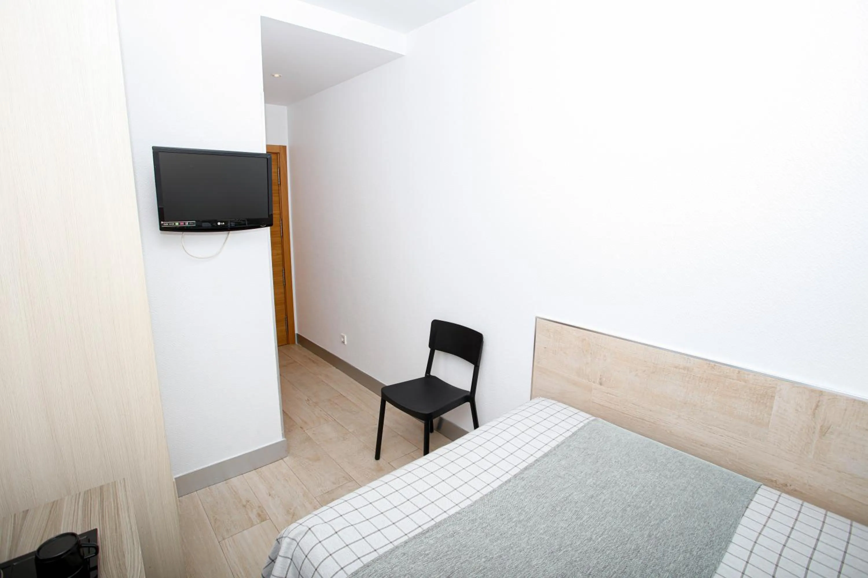 Bed in Hostal Castilla II Puerta del Sol