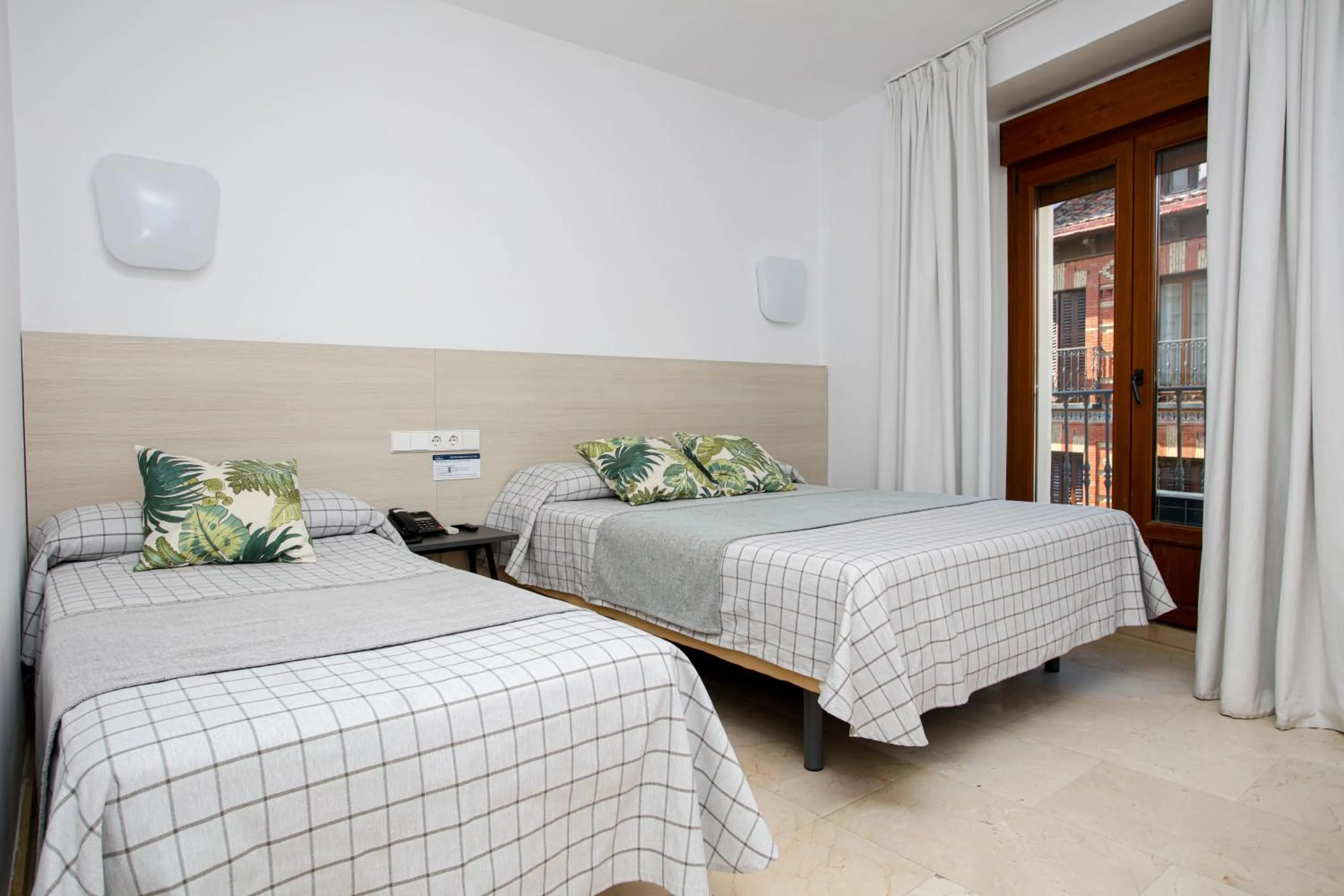 Photo of the whole room, Bed in Hostal Castilla II Puerta del Sol
