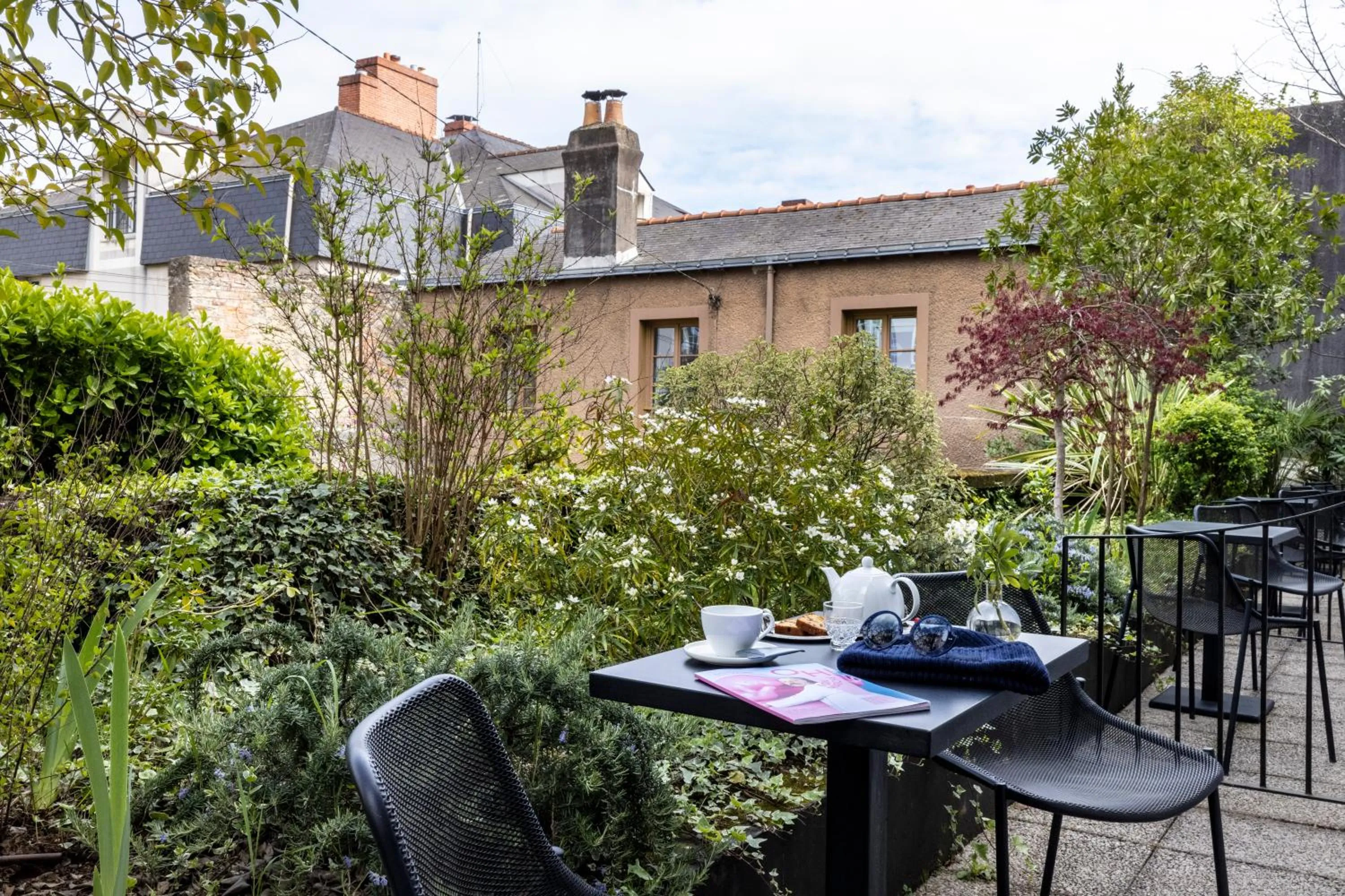 Patio in LHotel - face au château - boutique hôtel et séminaires