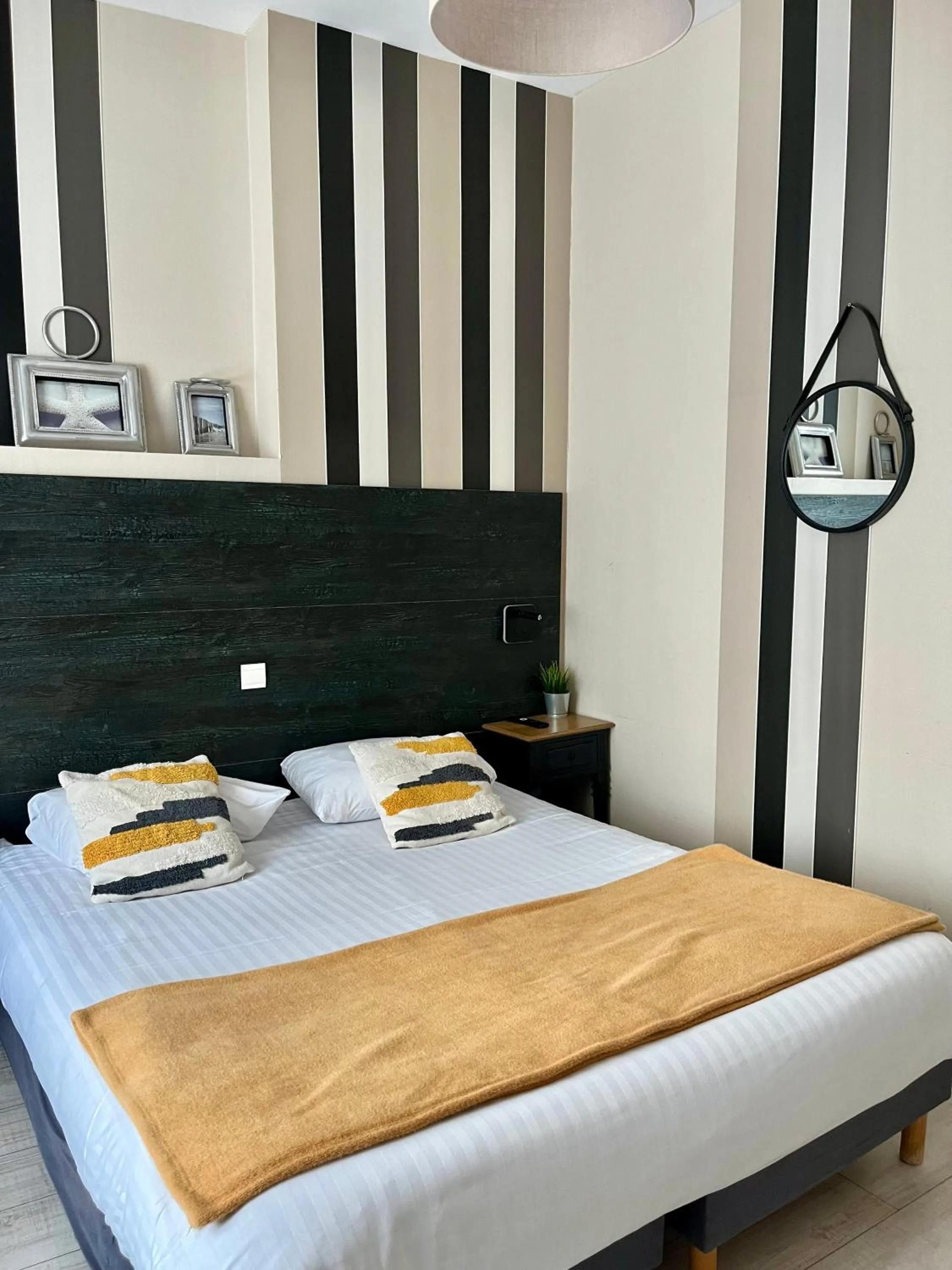 Bed in Hôtel de charme Equinoxe