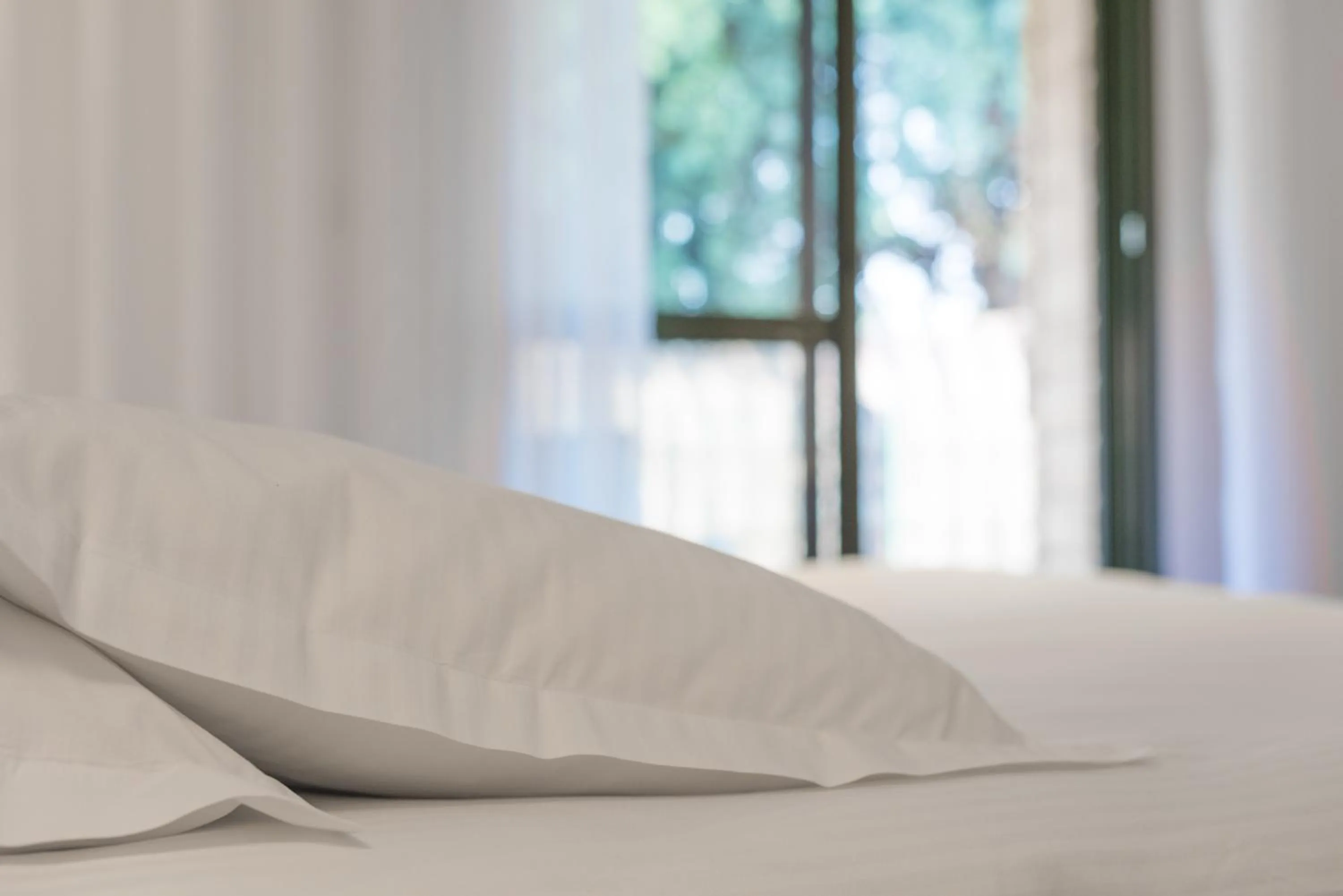 Bed in Logis Hôtel Domaine du Moulin Cavier - Restaurants & Spa