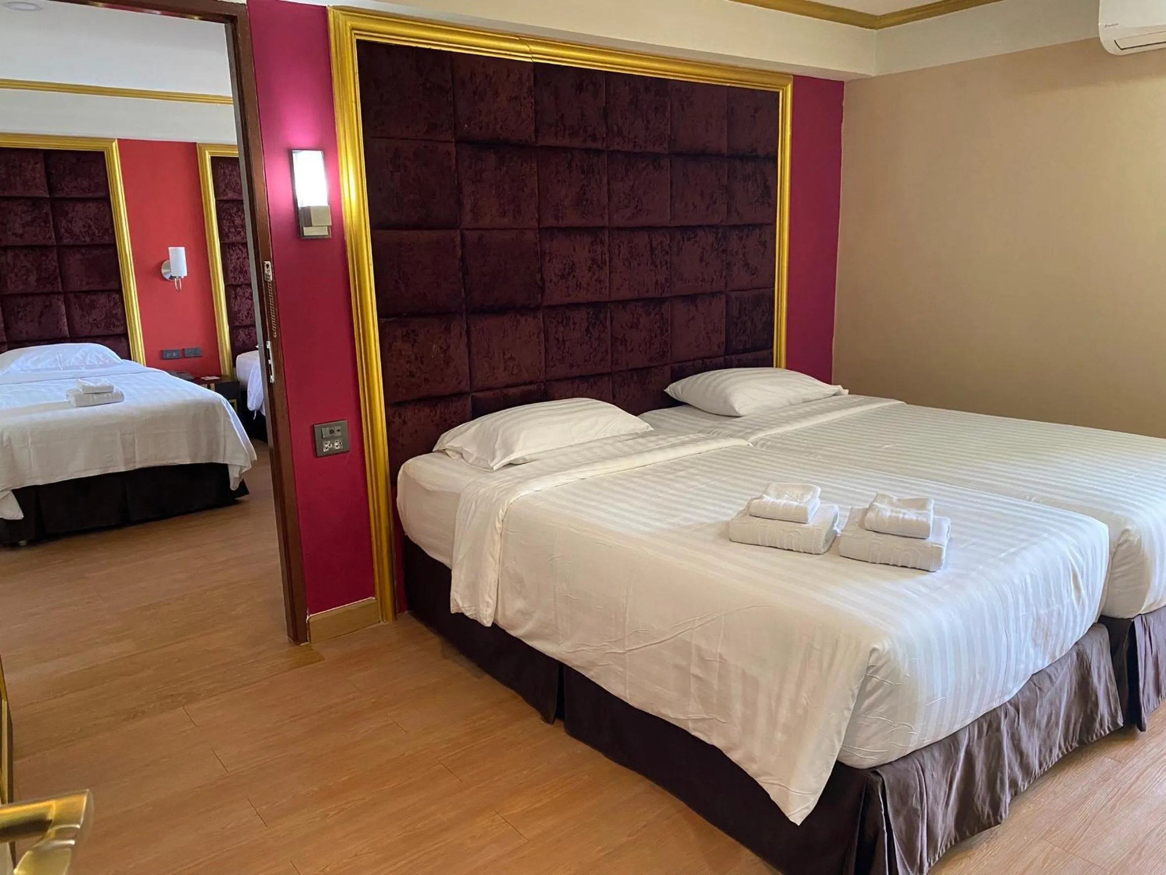 Bed in Grand Pink Hotel Hatyai