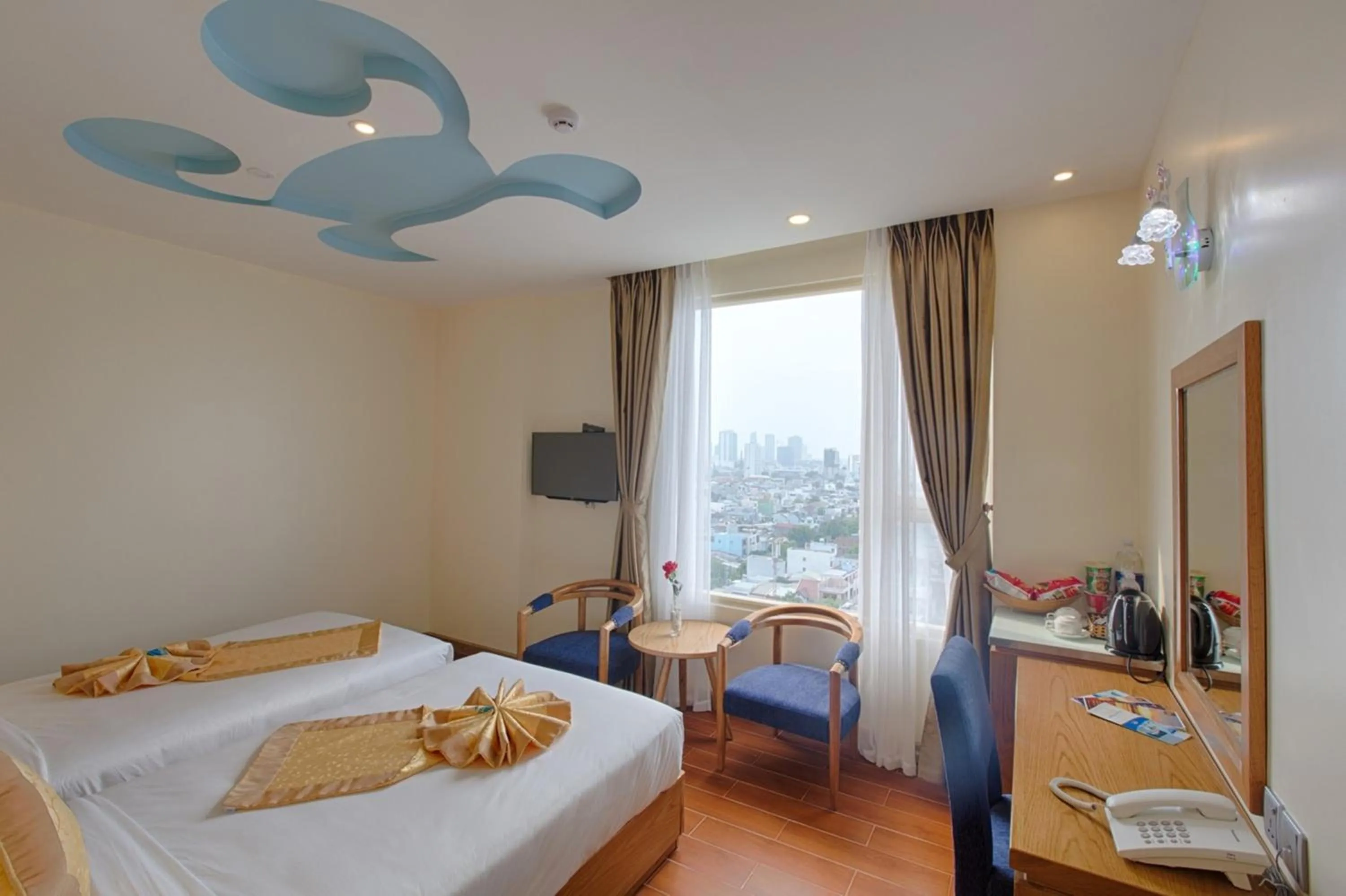 Living room, Bed in ANFADA Hotel Danang