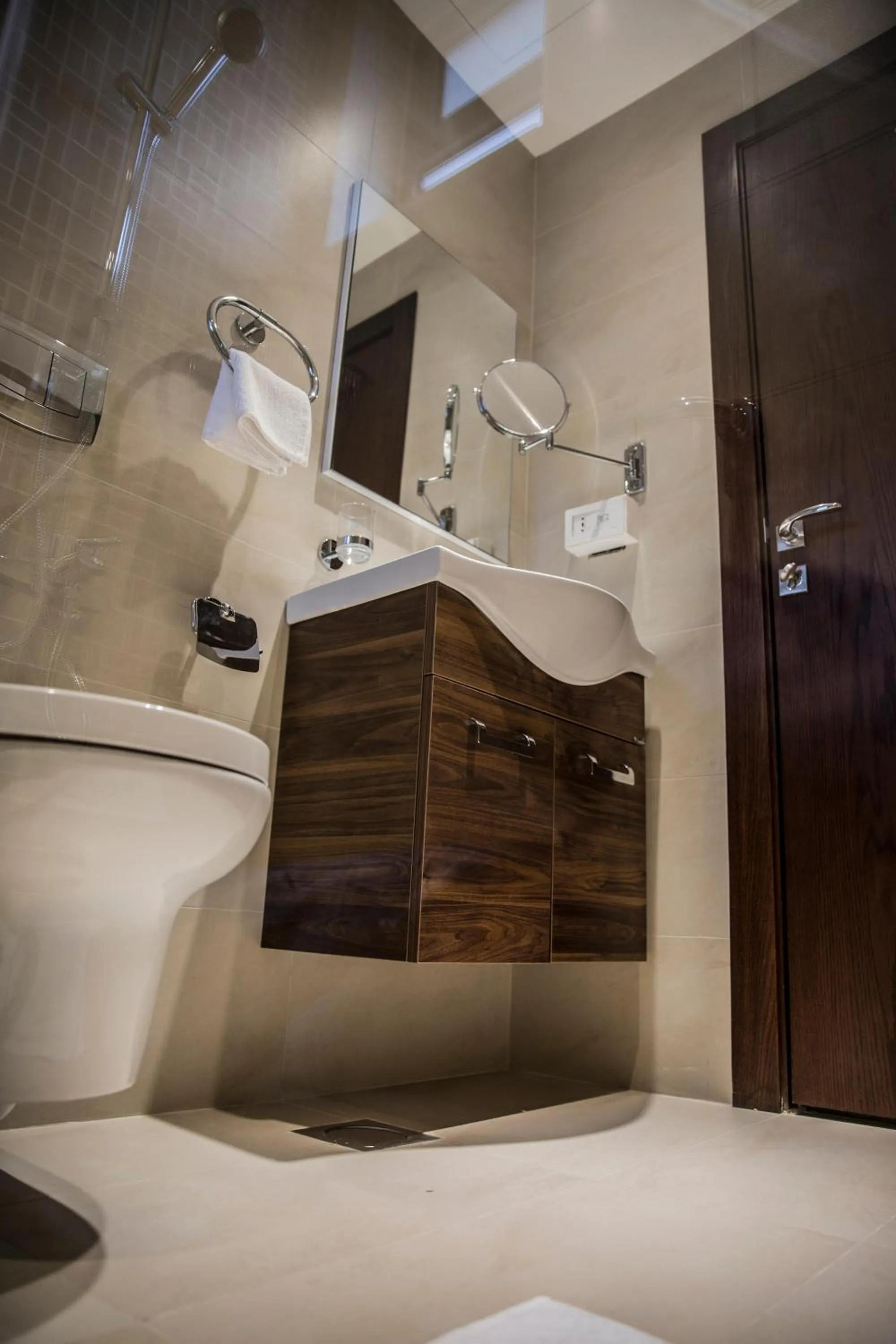 Bed in Naylover Hotel Suites