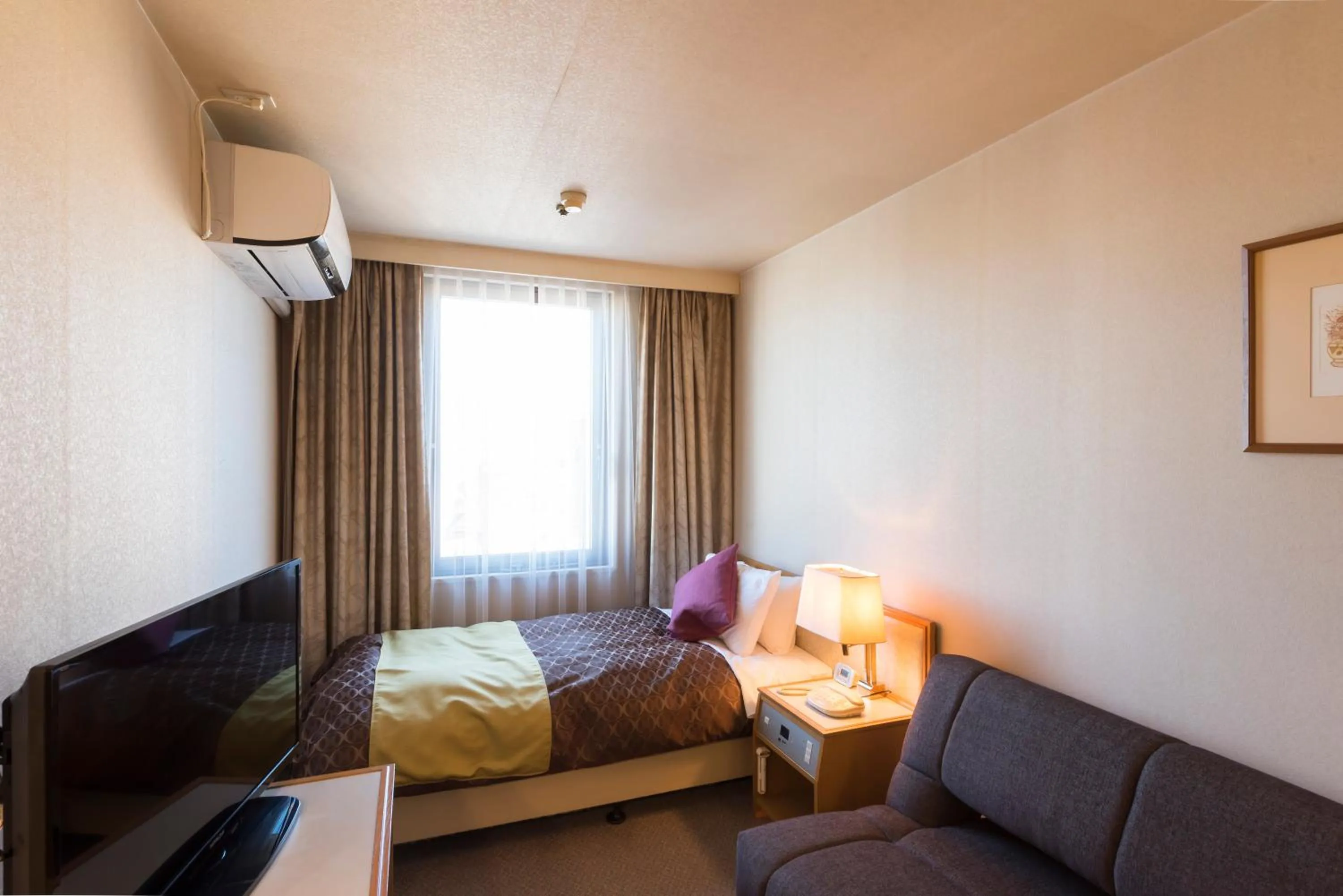 Bed in Sky Hotel Uozu