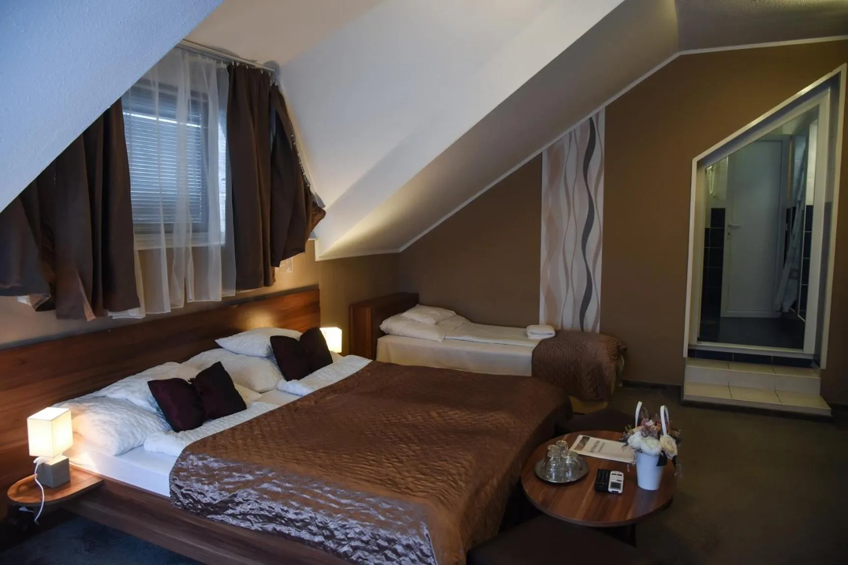 Photo of the whole room, Bed in Oázis Wellness Panzio