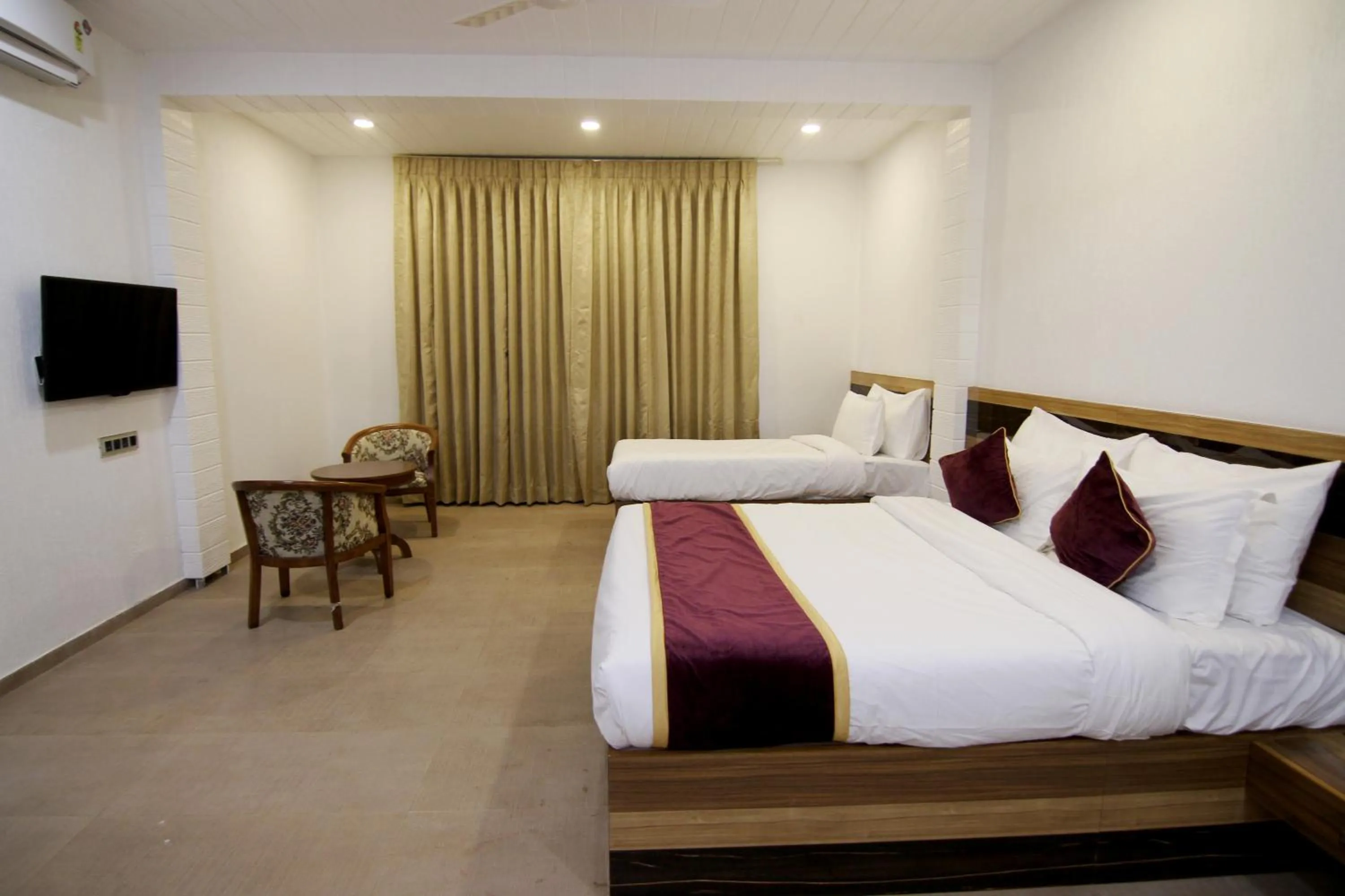 Bed in Forest County Resort Mahabaleshwar