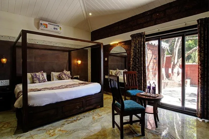 Bed in Forest County Resort Mahabaleshwar