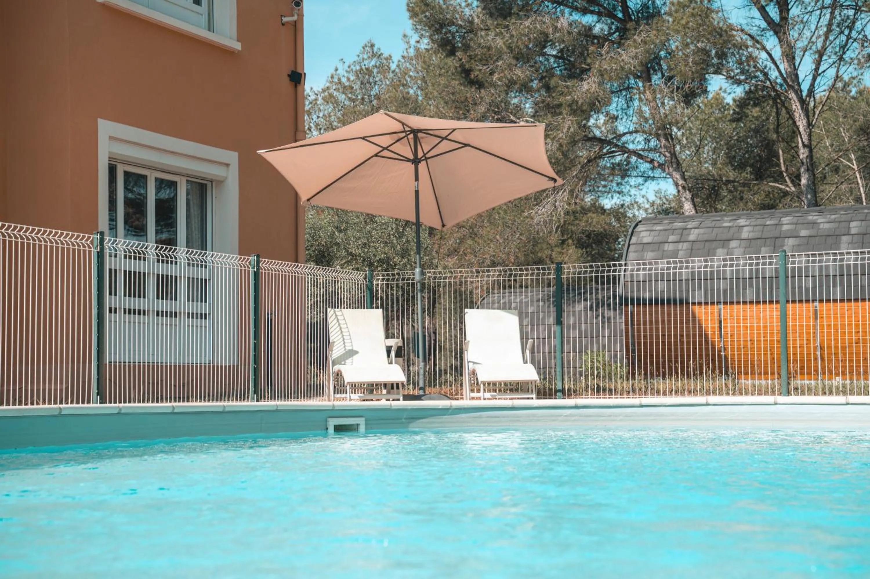 Pool view in Hotel Les Rocailles