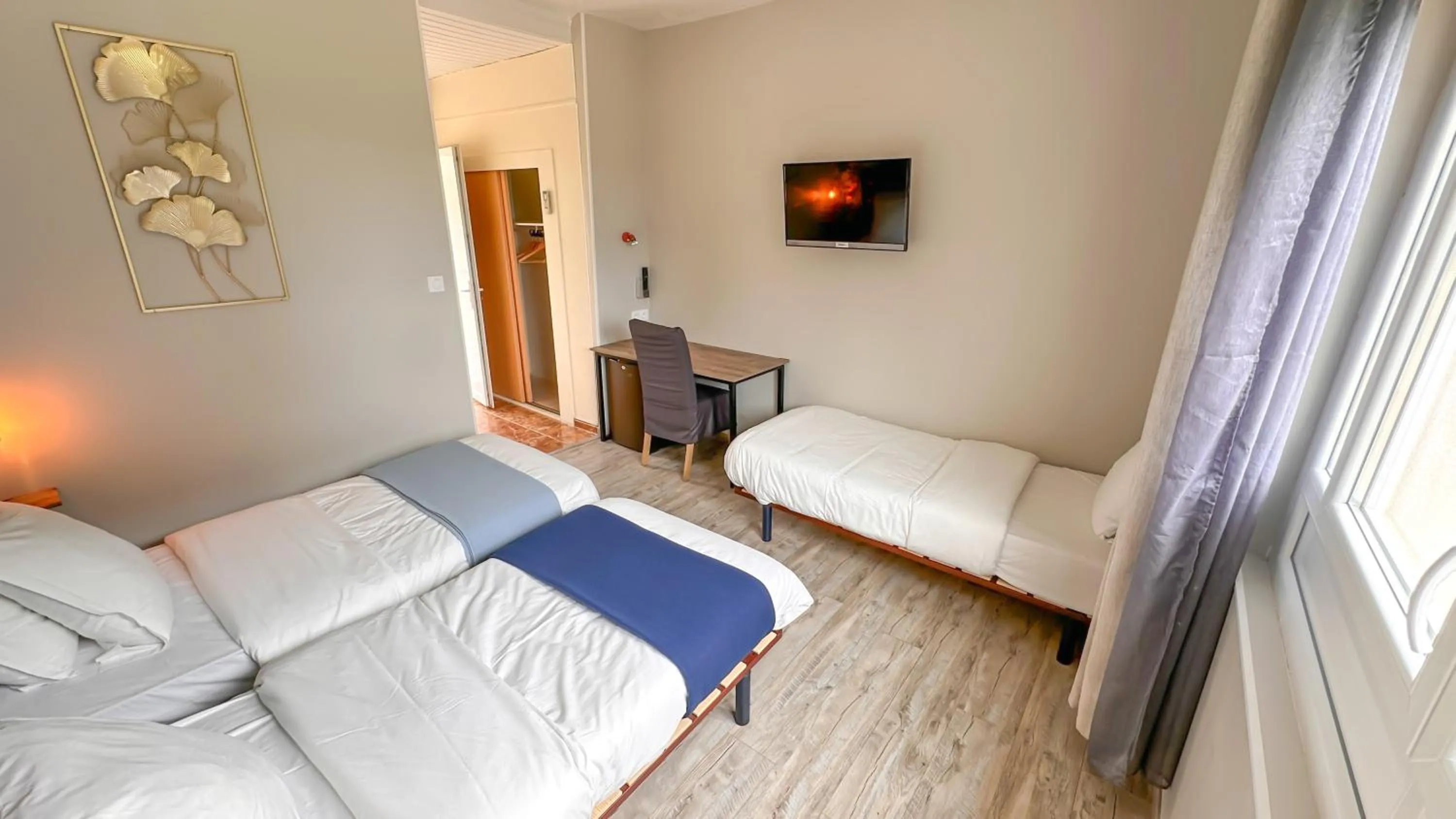 Bed in Hotel Les Rocailles