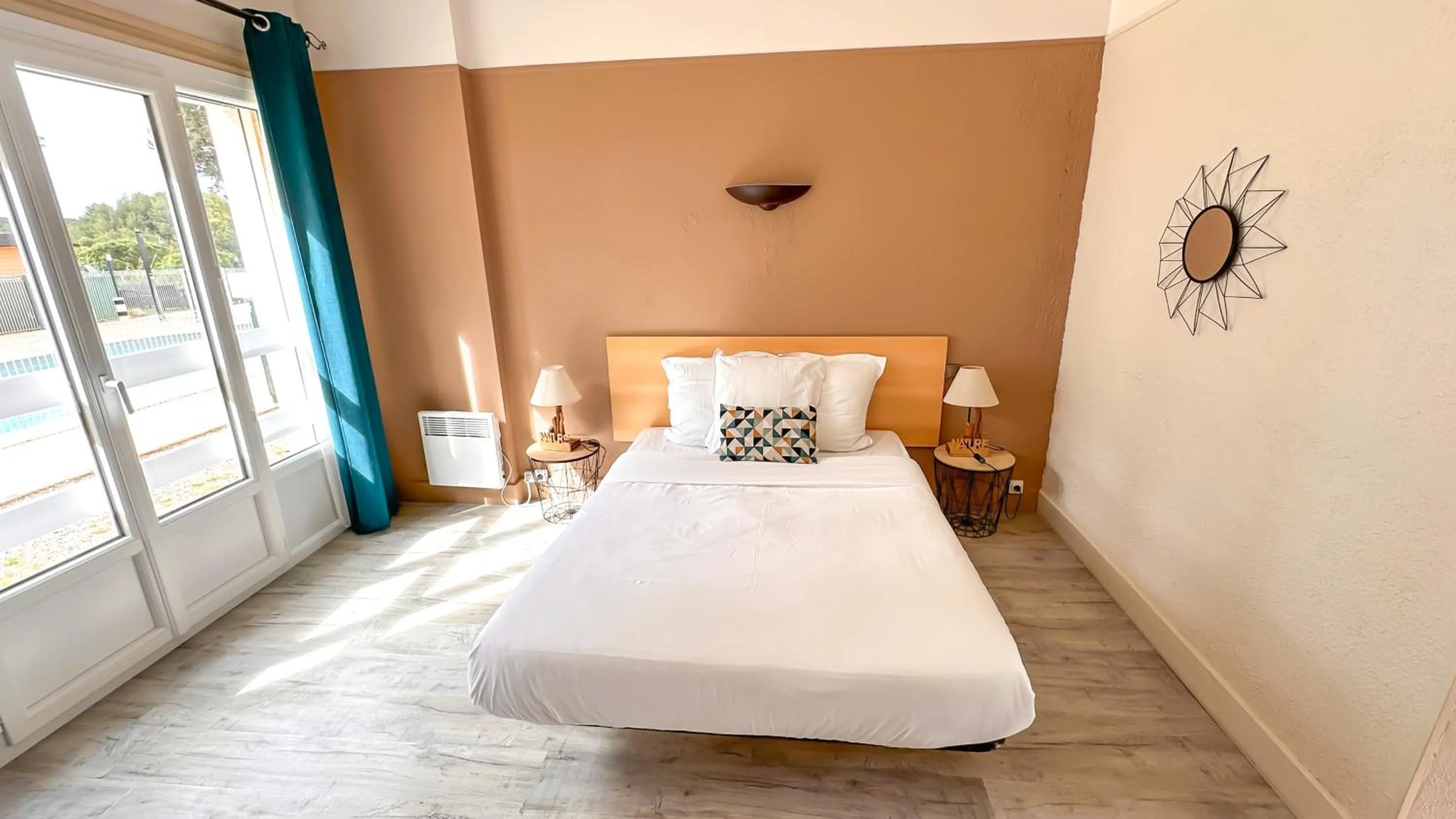 Bed in Hotel Les Rocailles