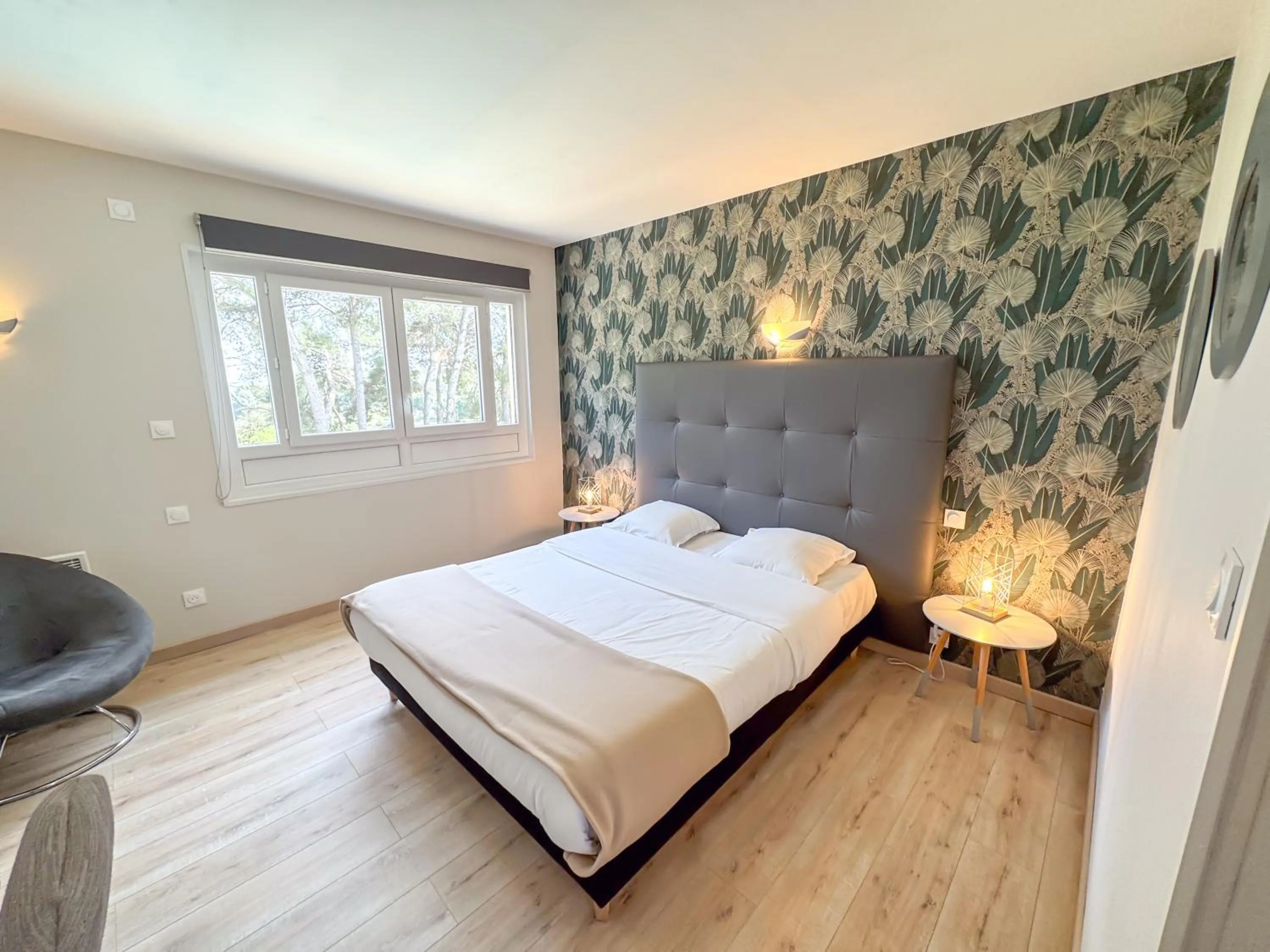 Bed in Hotel Les Rocailles