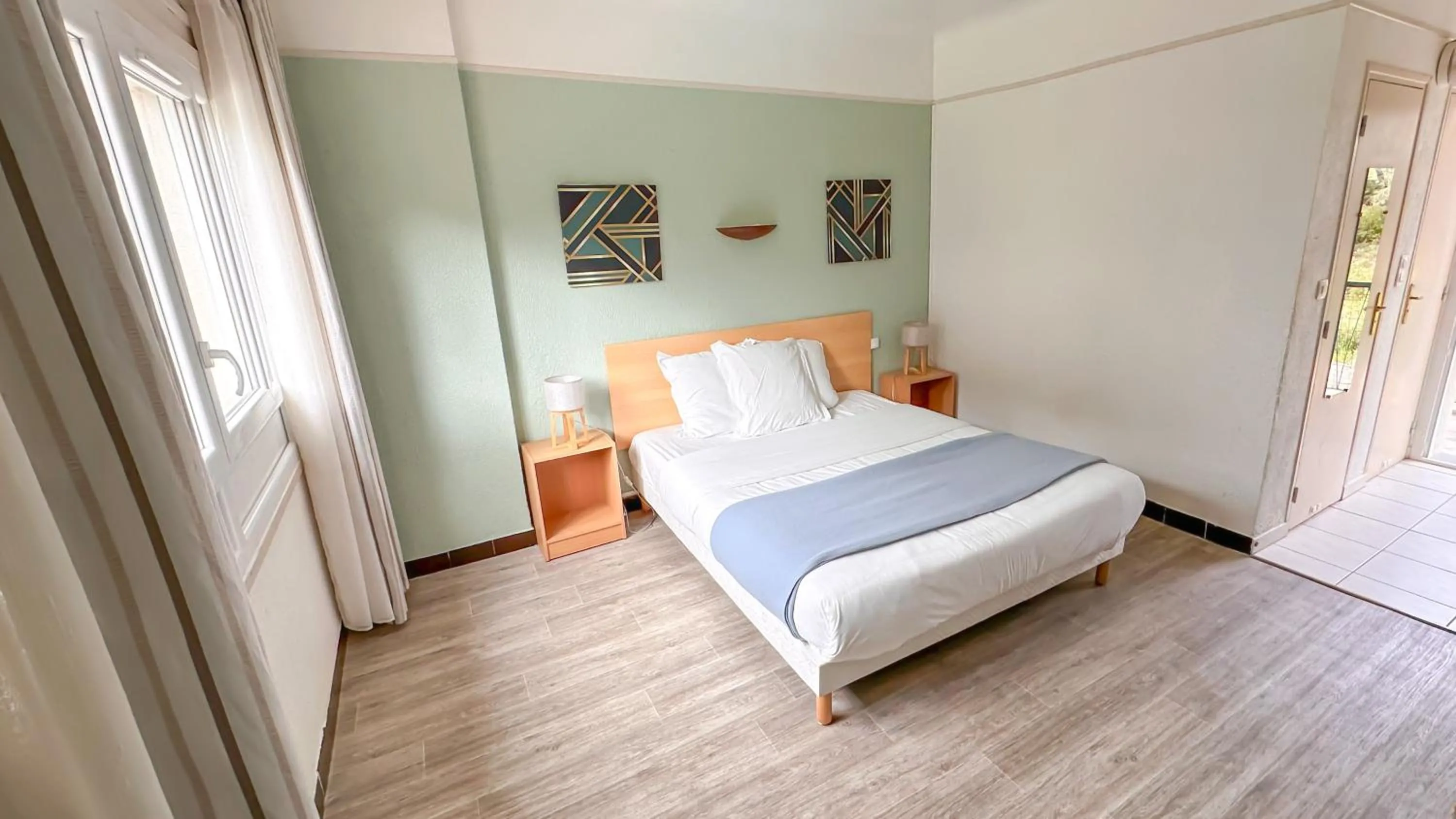 Bed in Hotel Les Rocailles