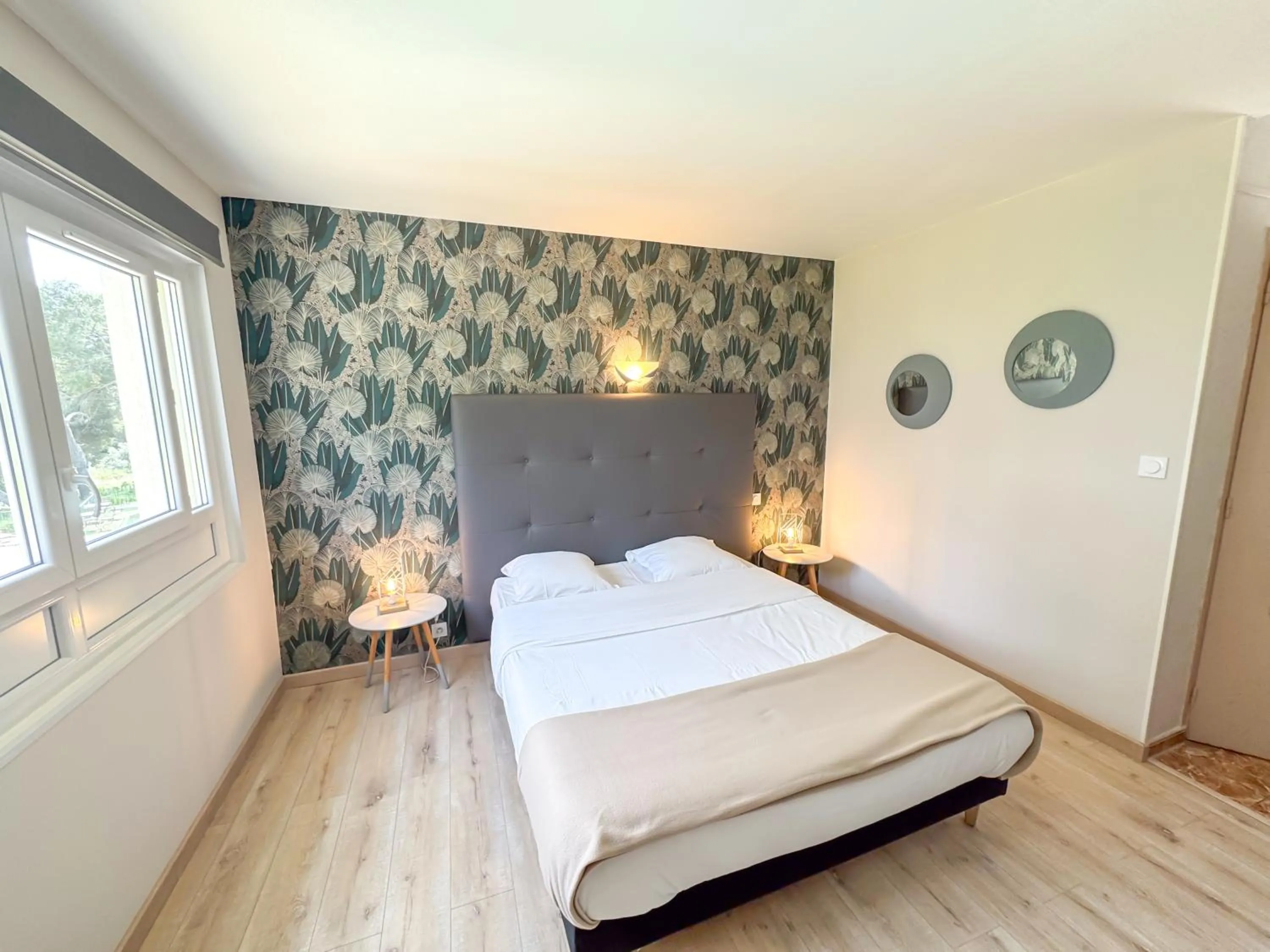 Bed in Hotel Les Rocailles