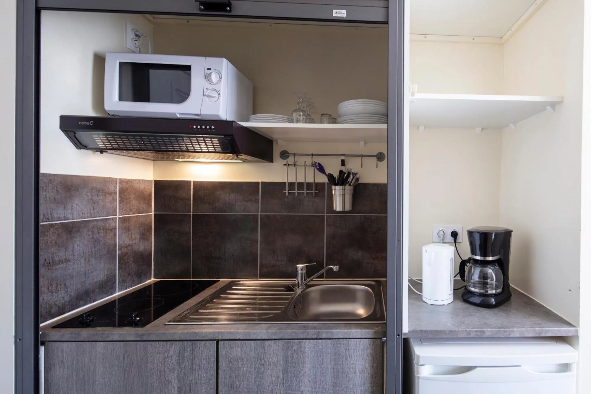 Kitchen or kitchenette in Hotel Les Rocailles