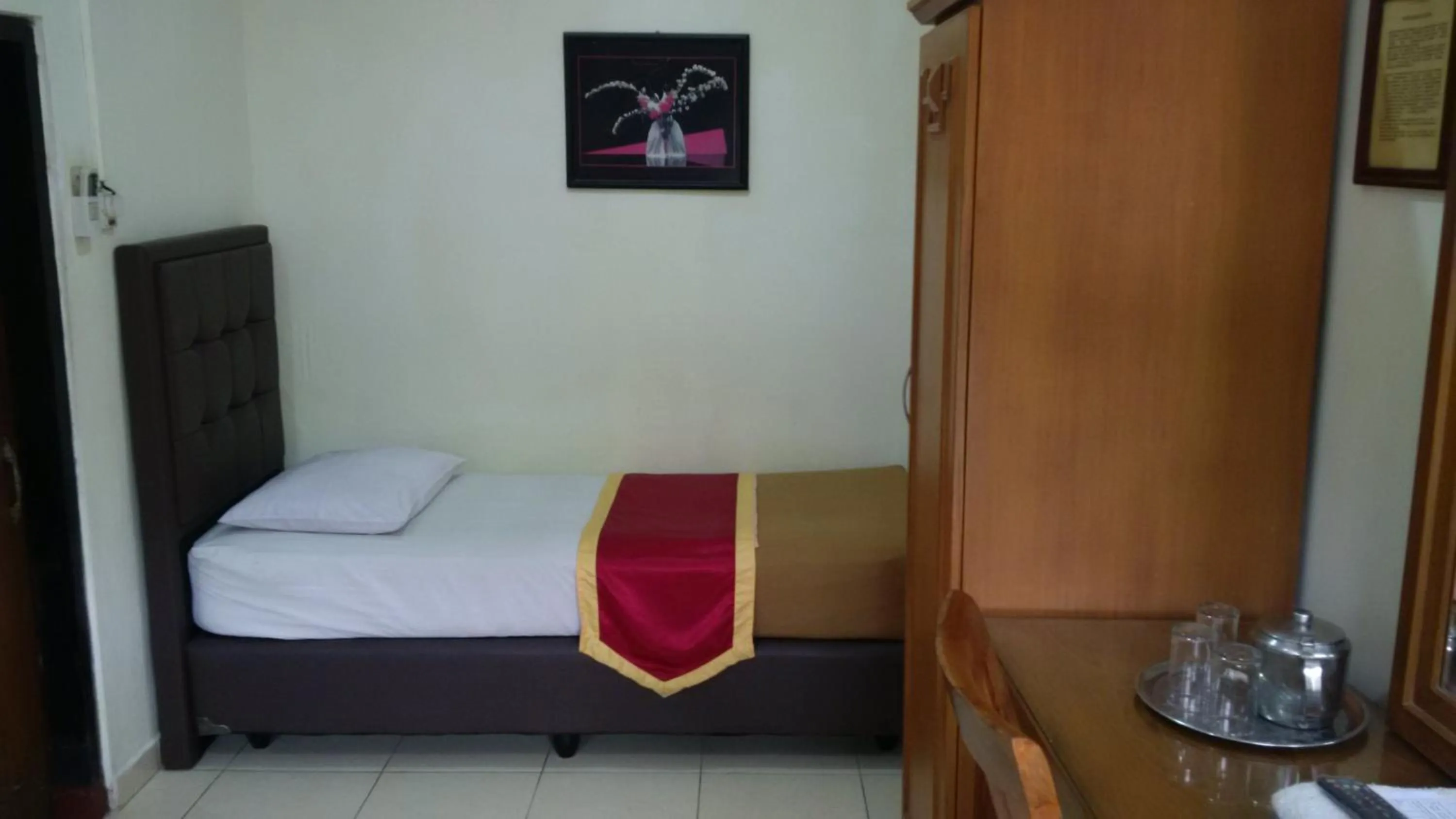Bed in Hotel Priangan