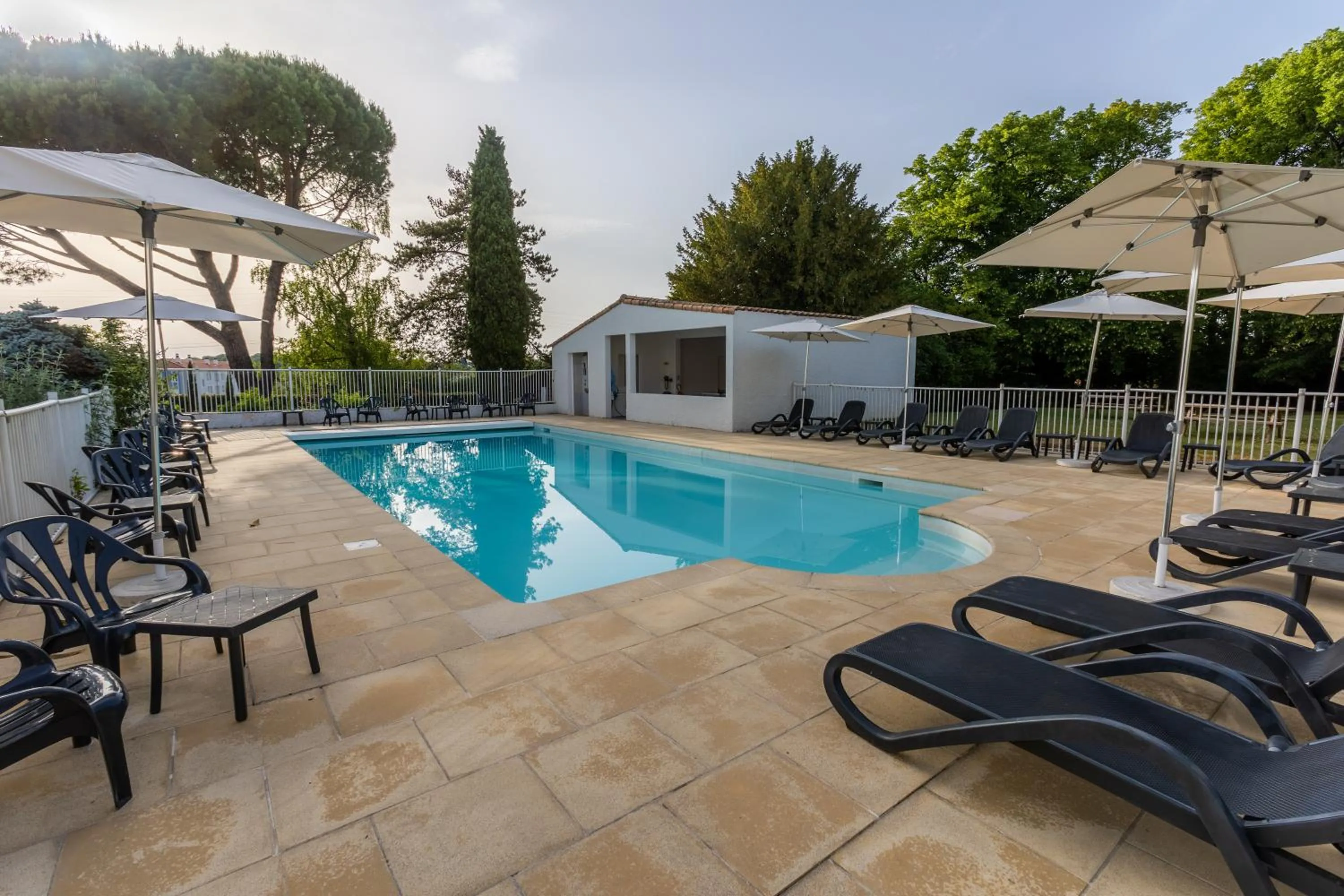 Garden view in Logis LE RABELAIS Hôtel- Restaurant - SPA