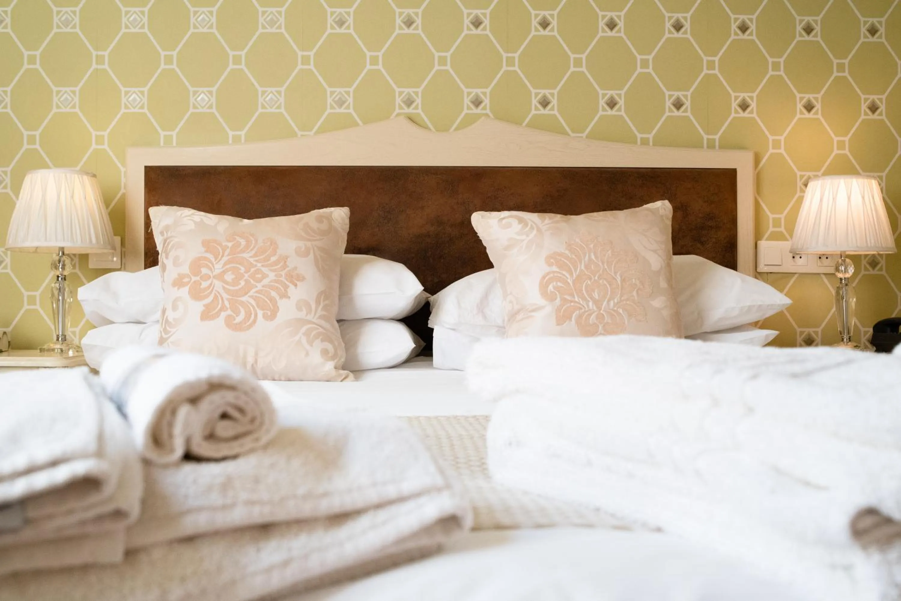 Bed in Logis Hotel De France