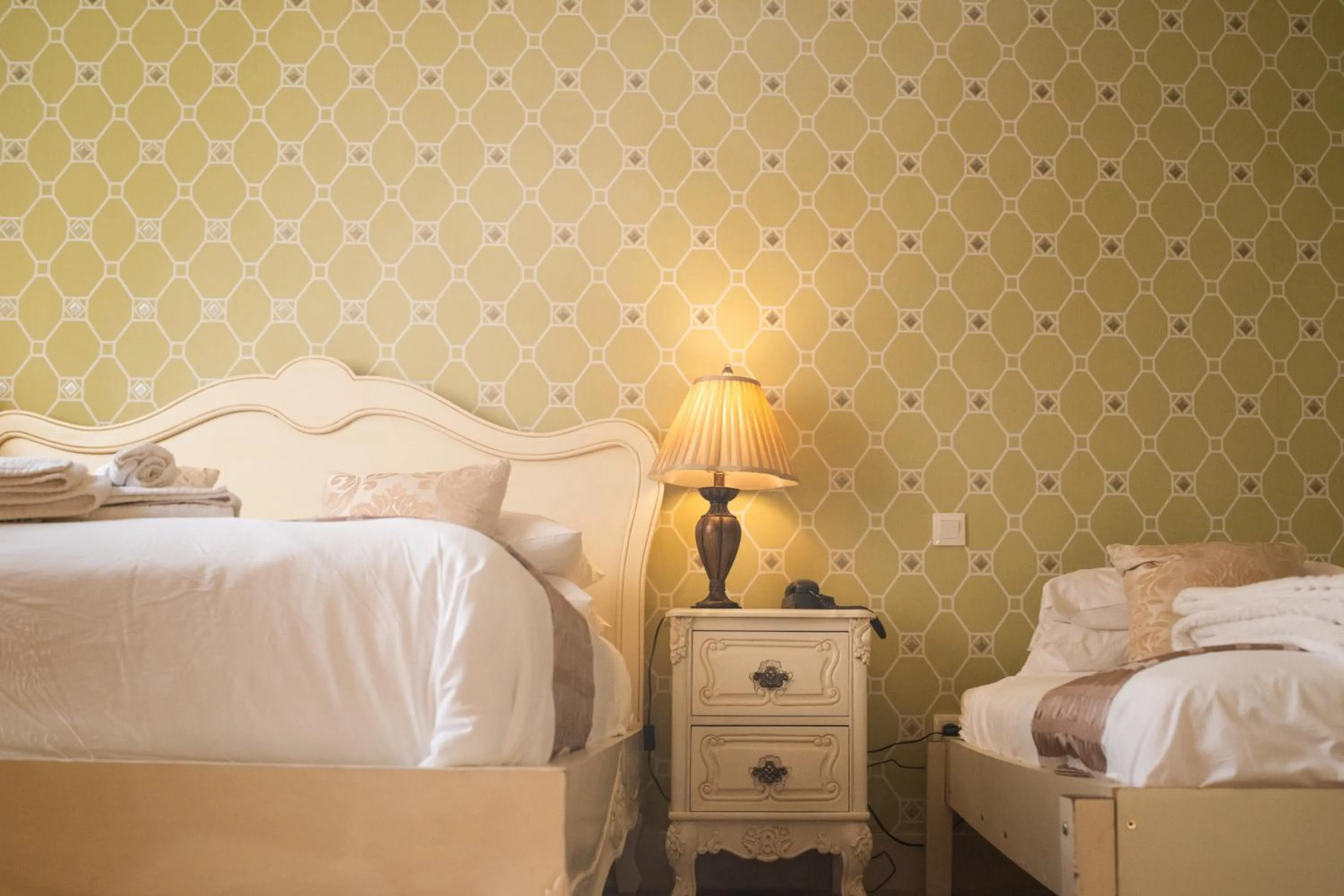 Bed in Logis Hotel De France