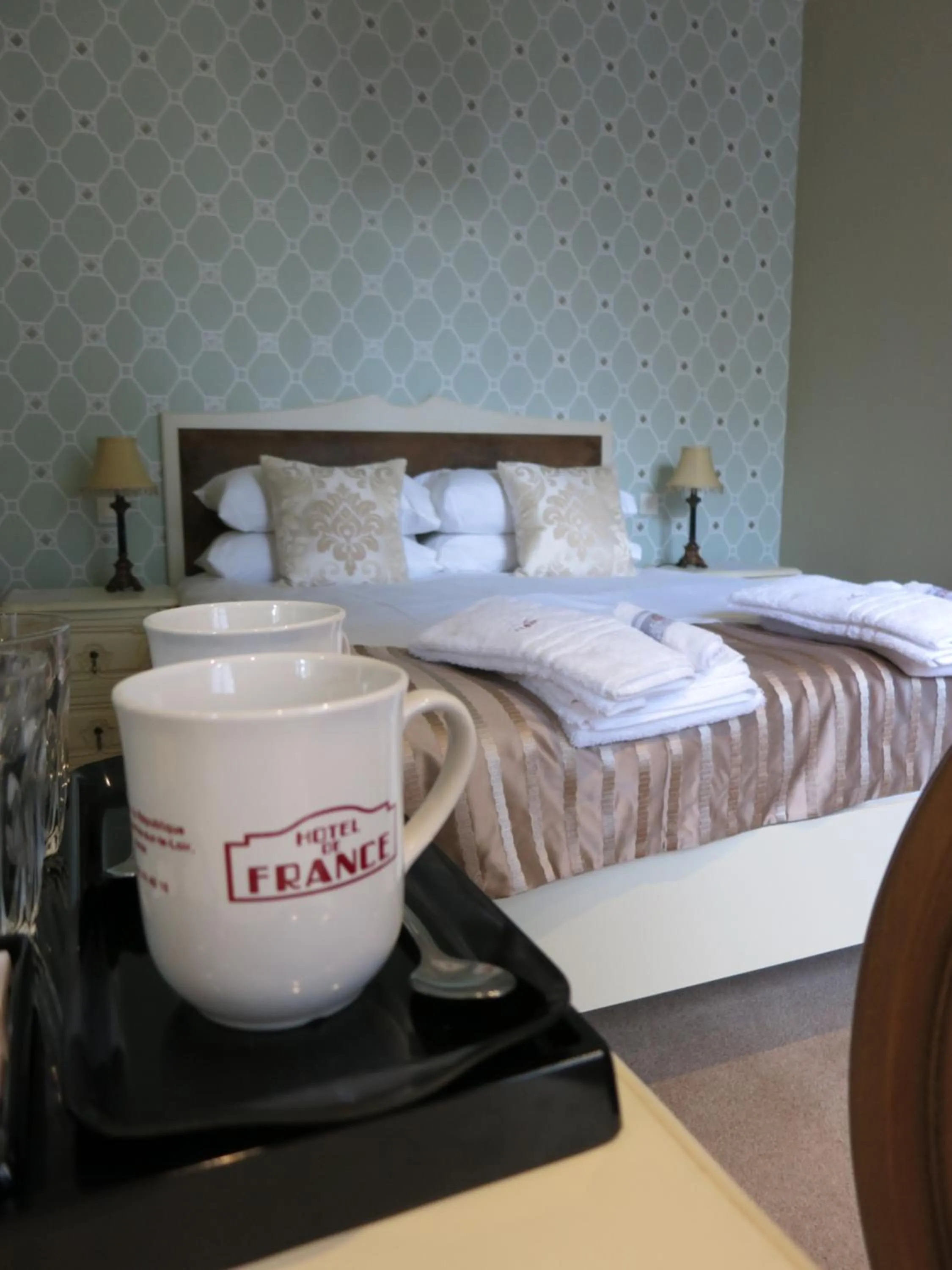 Decorative detail, Bed in Logis Hotel De France