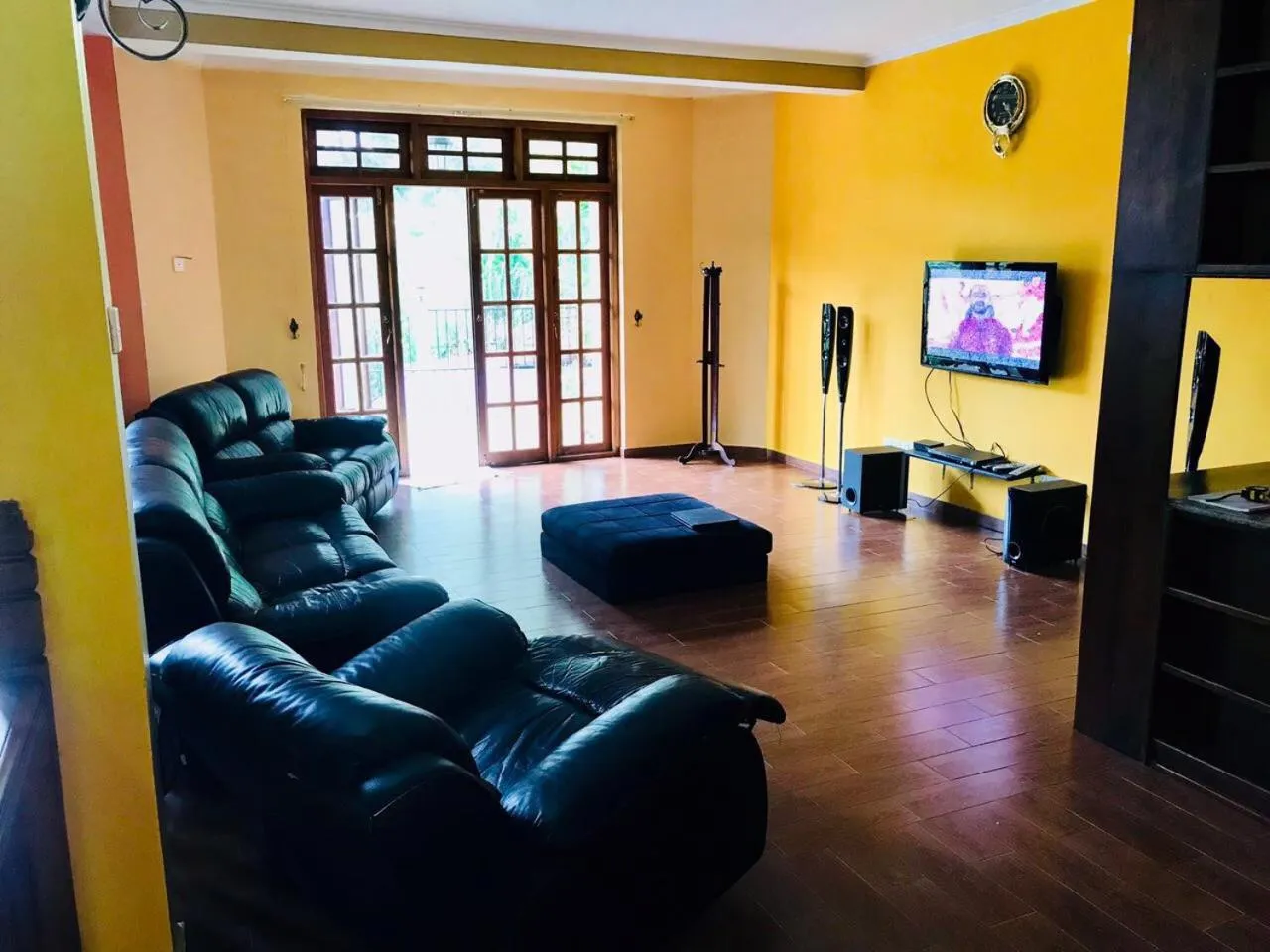 Communal lounge/ TV room in Villa Familia