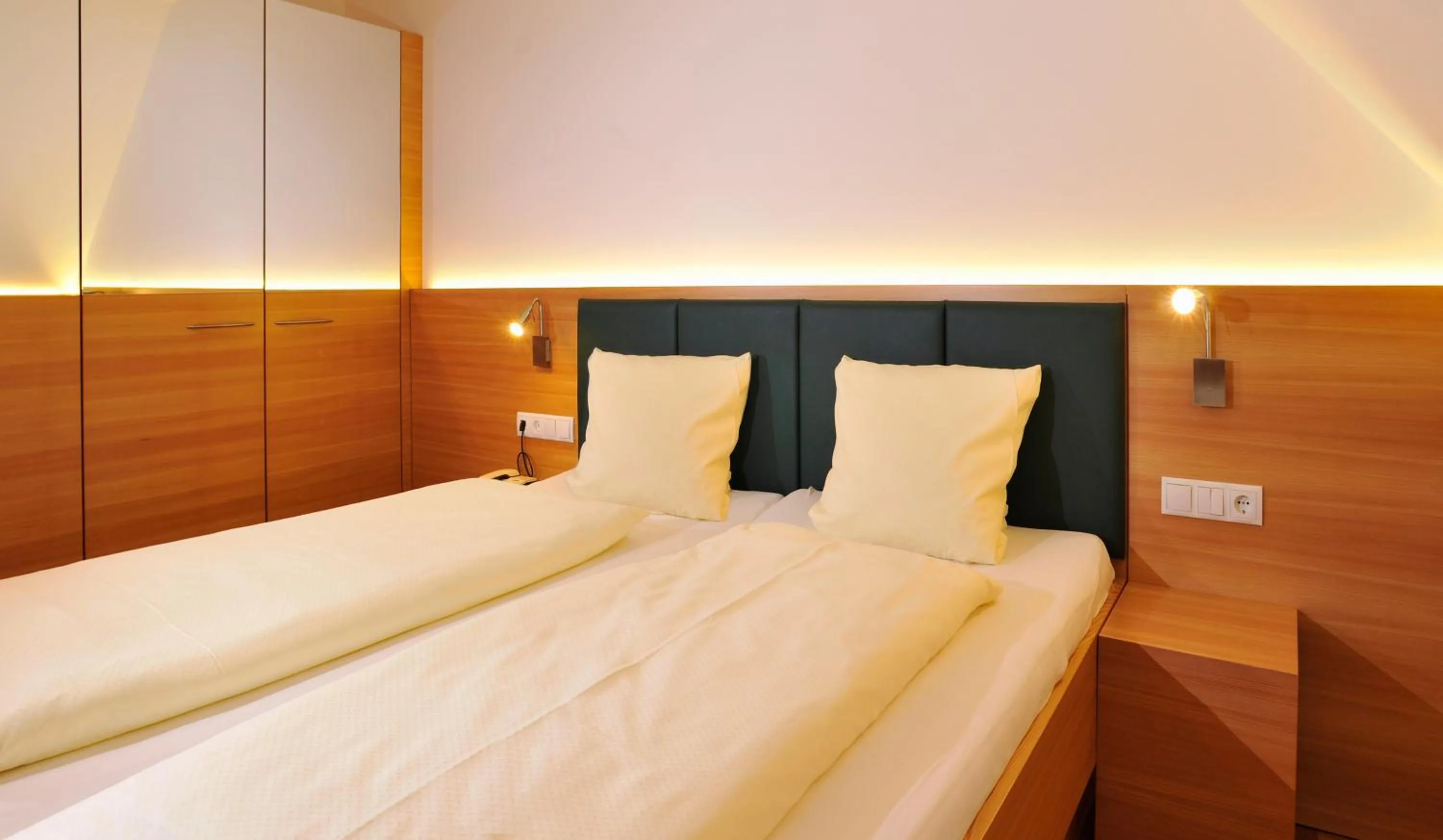 Bedroom in Sattlerhof Genießerhotel & Weingut