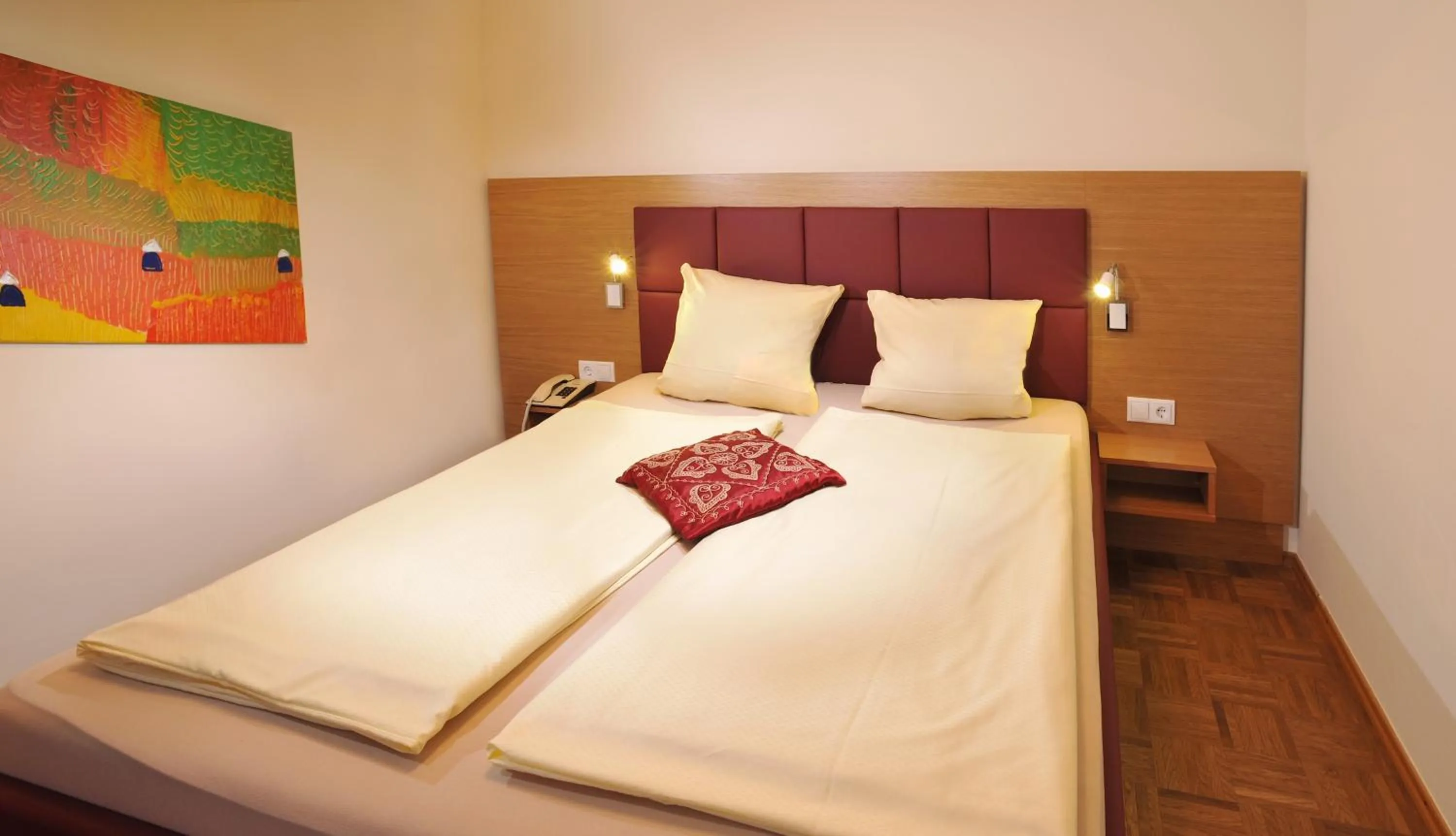 Bedroom in Sattlerhof Genießerhotel & Weingut