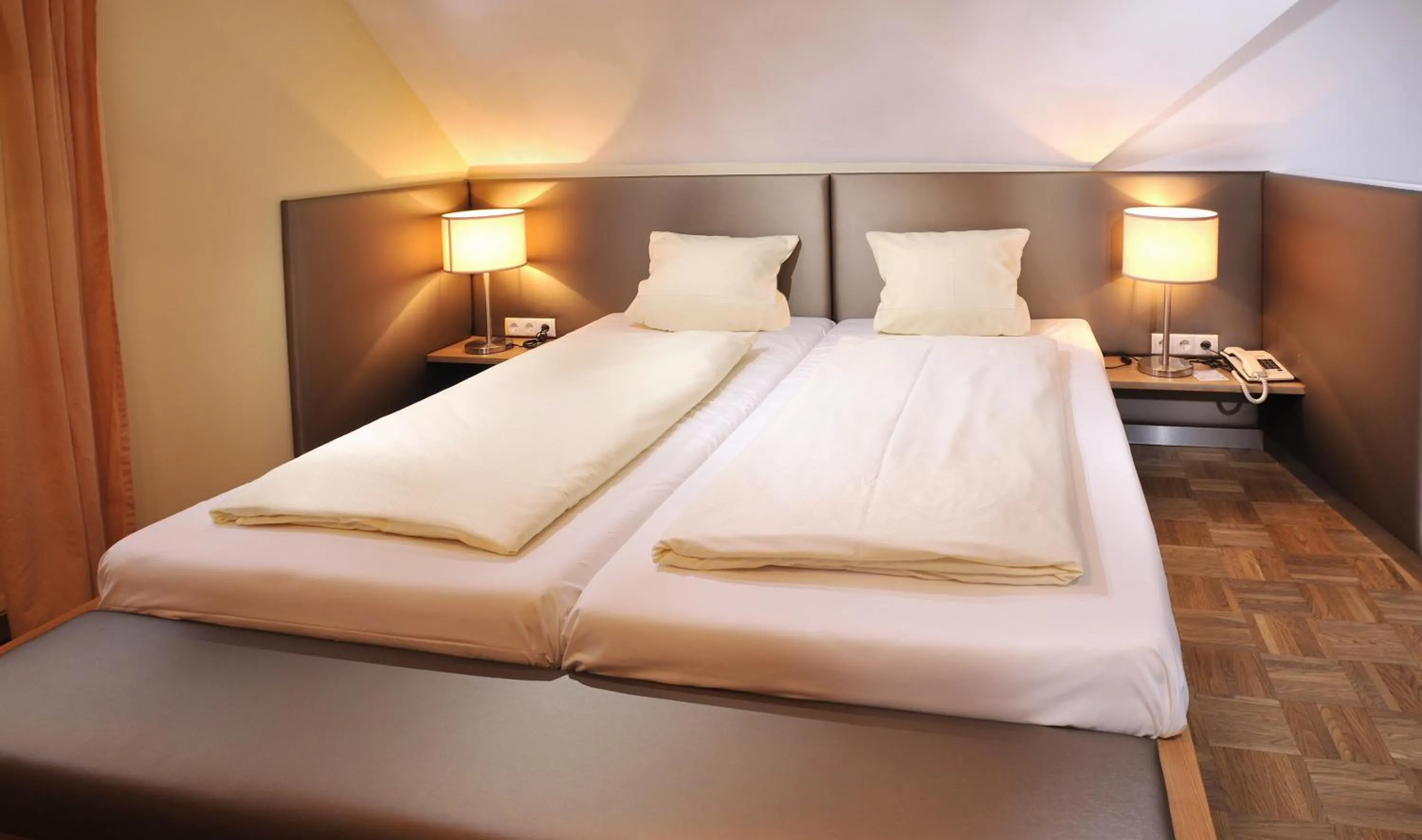 Bedroom in Sattlerhof Genießerhotel & Weingut