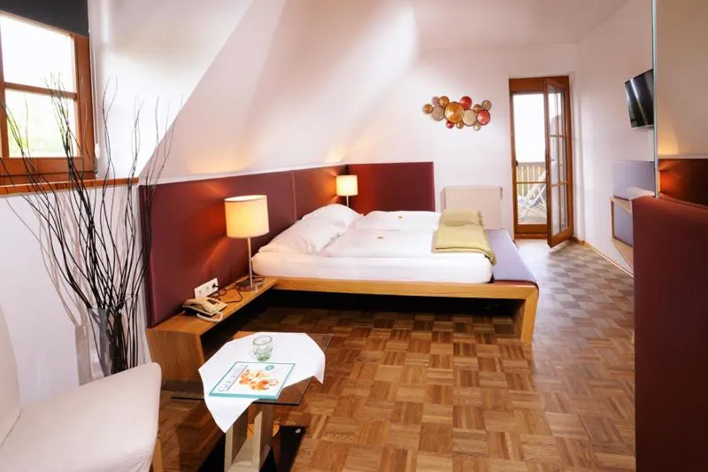 Bedroom in Sattlerhof Genießerhotel & Weingut